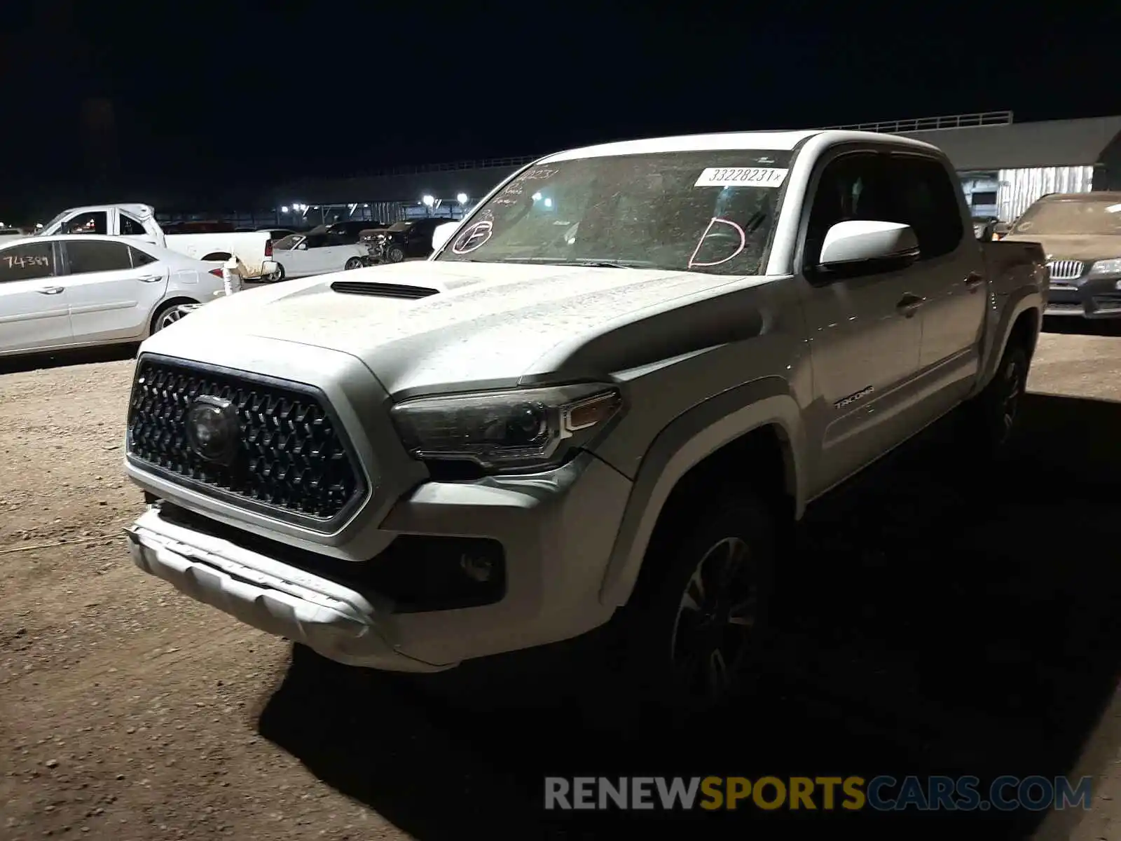 2 Photograph of a damaged car 3TMCZ5AN6KM240194 TOYOTA TACOMA 2019