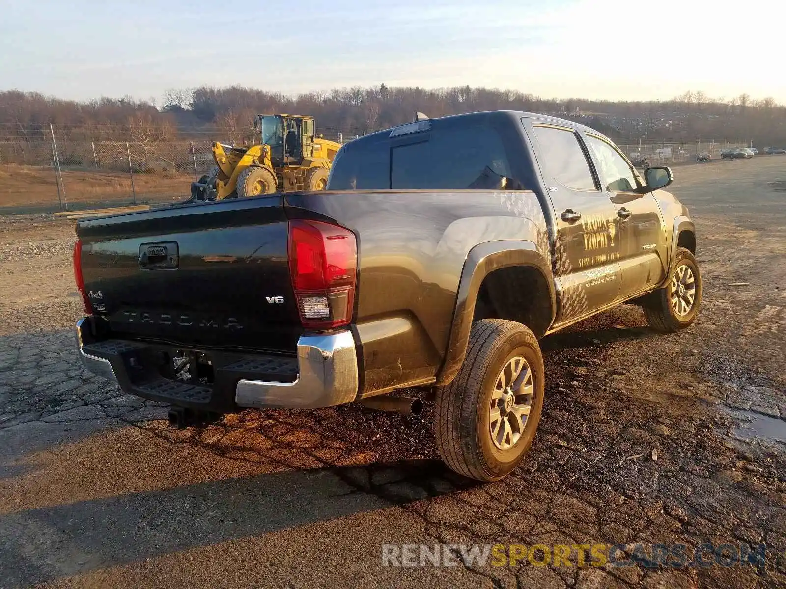 4 Photograph of a damaged car 3TMCZ5AN6KM242642 TOYOTA TACOMA 2019