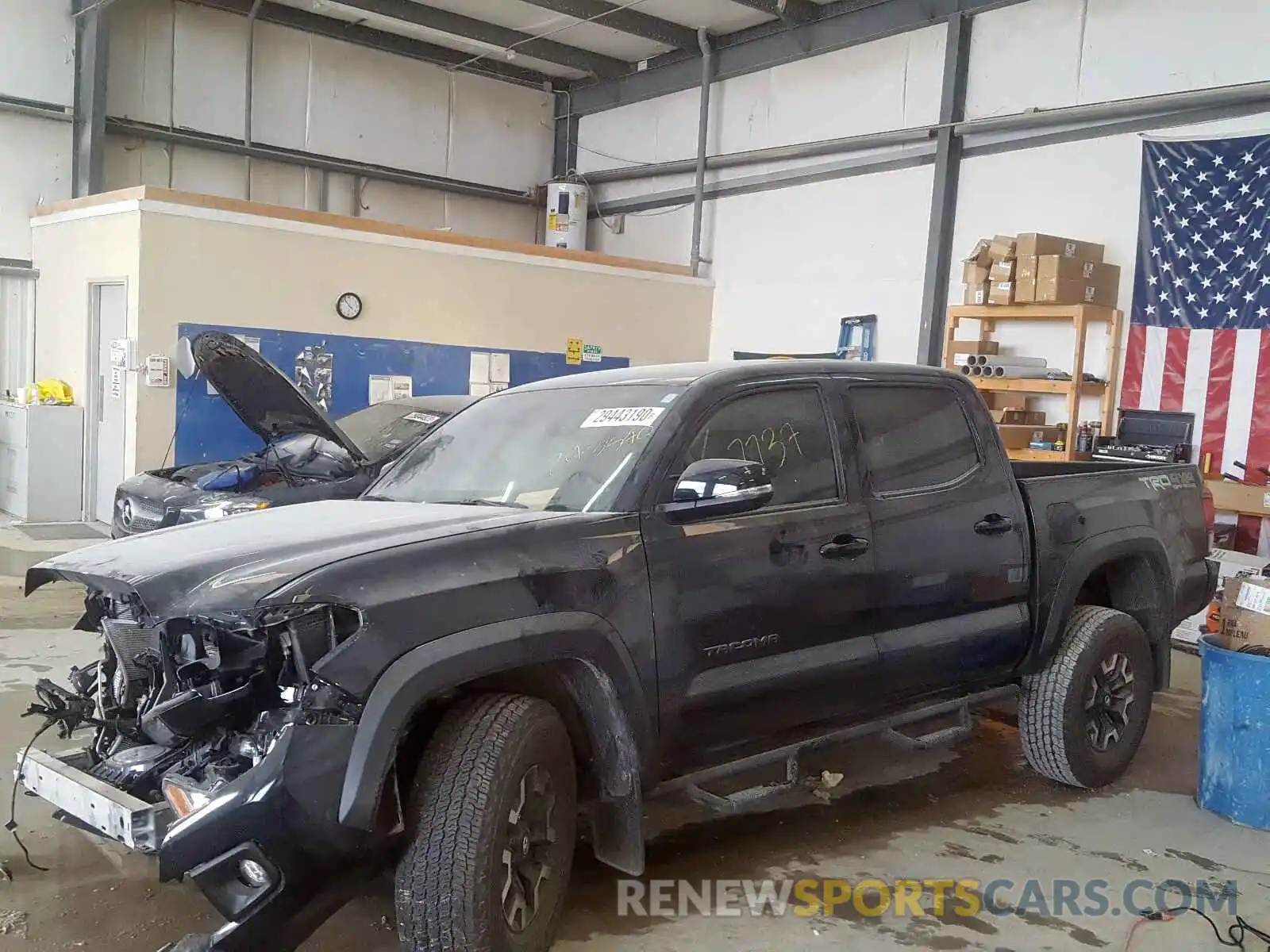 2 Photograph of a damaged car 3TMCZ5AN6KM243340 TOYOTA TACOMA 2019