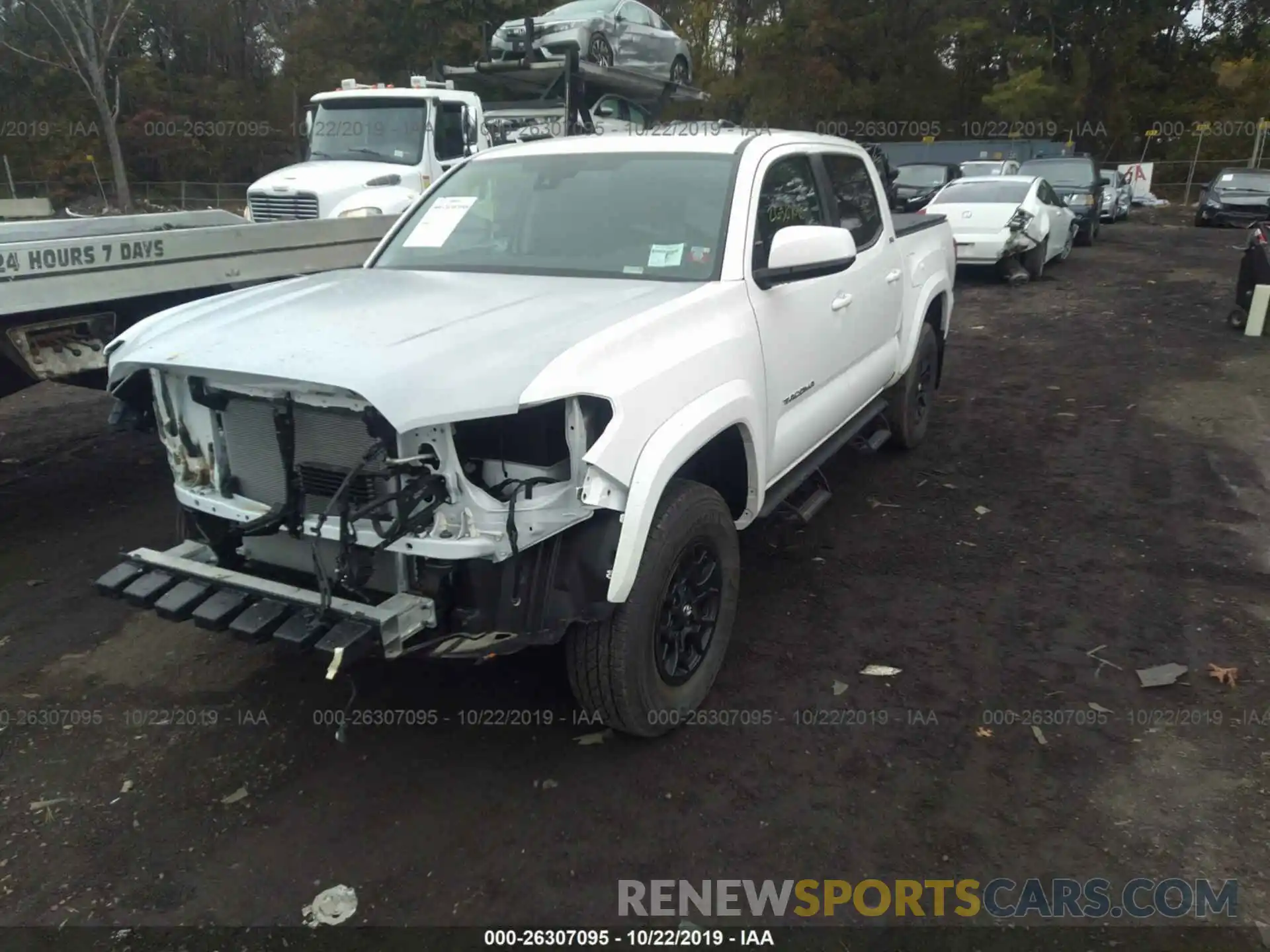 2 Photograph of a damaged car 3TMCZ5AN6KM246271 TOYOTA TACOMA 2019