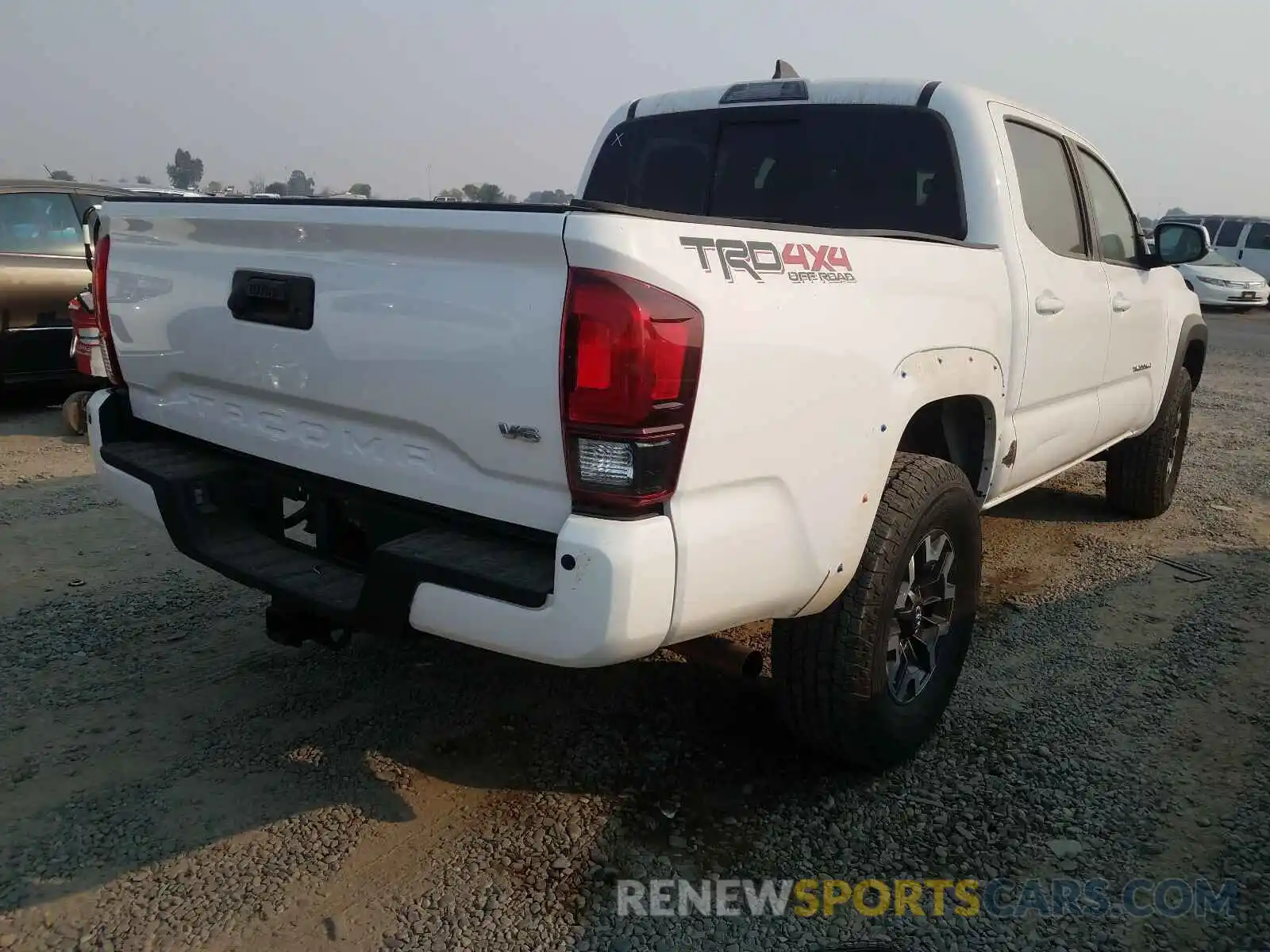 4 Photograph of a damaged car 3TMCZ5AN6KM246478 TOYOTA TACOMA 2019