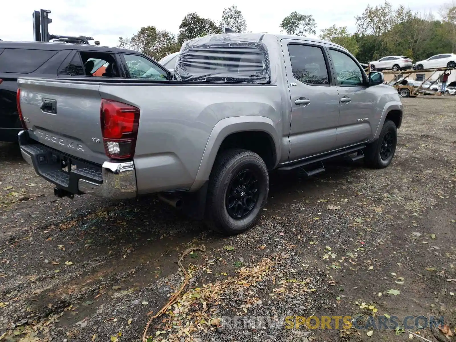 4 Photograph of a damaged car 3TMCZ5AN6KM246738 TOYOTA TACOMA 2019