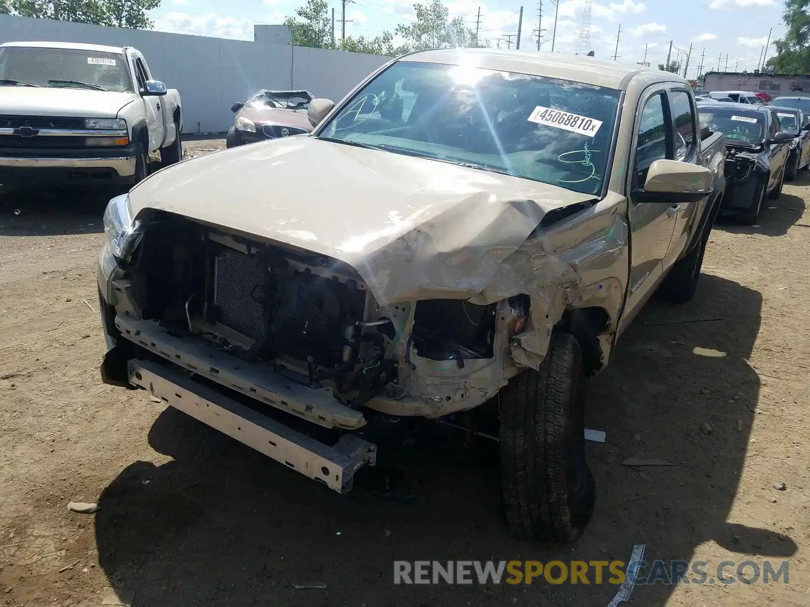 2 Photograph of a damaged car 3TMCZ5AN6KM247937 TOYOTA TACOMA 2019