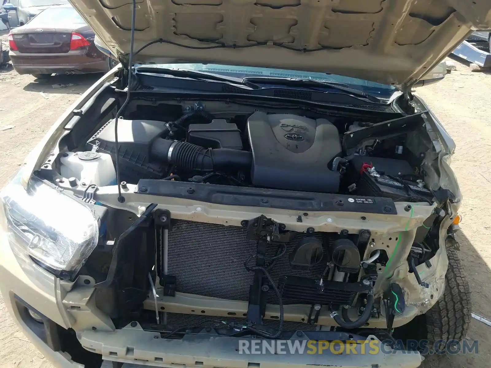 7 Photograph of a damaged car 3TMCZ5AN6KM247937 TOYOTA TACOMA 2019