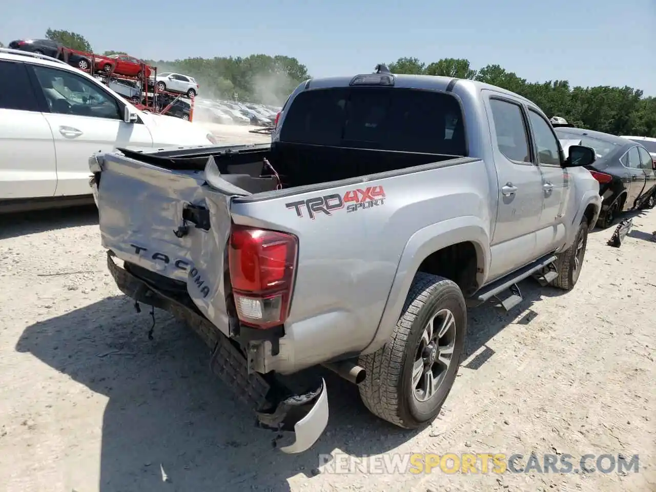 4 Photograph of a damaged car 3TMCZ5AN6KM251311 TOYOTA TACOMA 2019