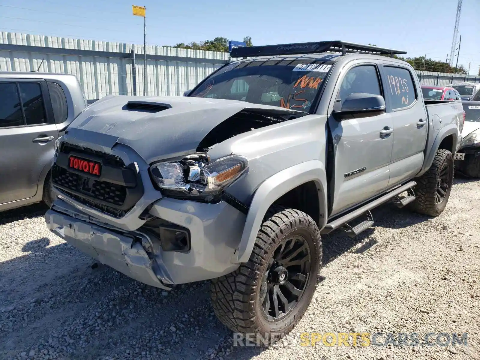 2 Photograph of a damaged car 3TMCZ5AN6KM254368 TOYOTA TACOMA 2019