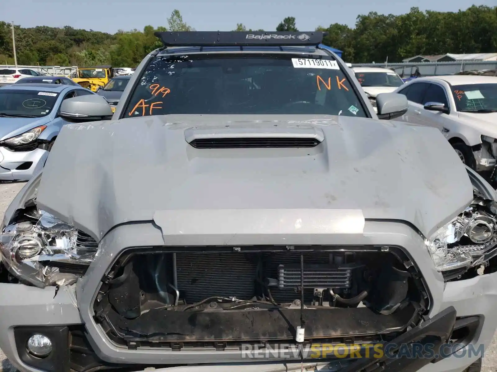 7 Photograph of a damaged car 3TMCZ5AN6KM254368 TOYOTA TACOMA 2019