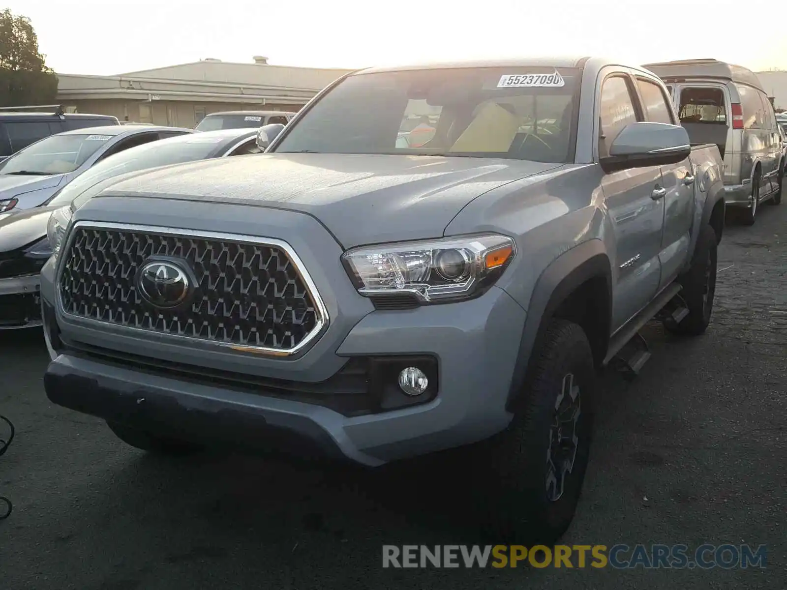 2 Photograph of a damaged car 3TMCZ5AN6KM260168 TOYOTA TACOMA 2019