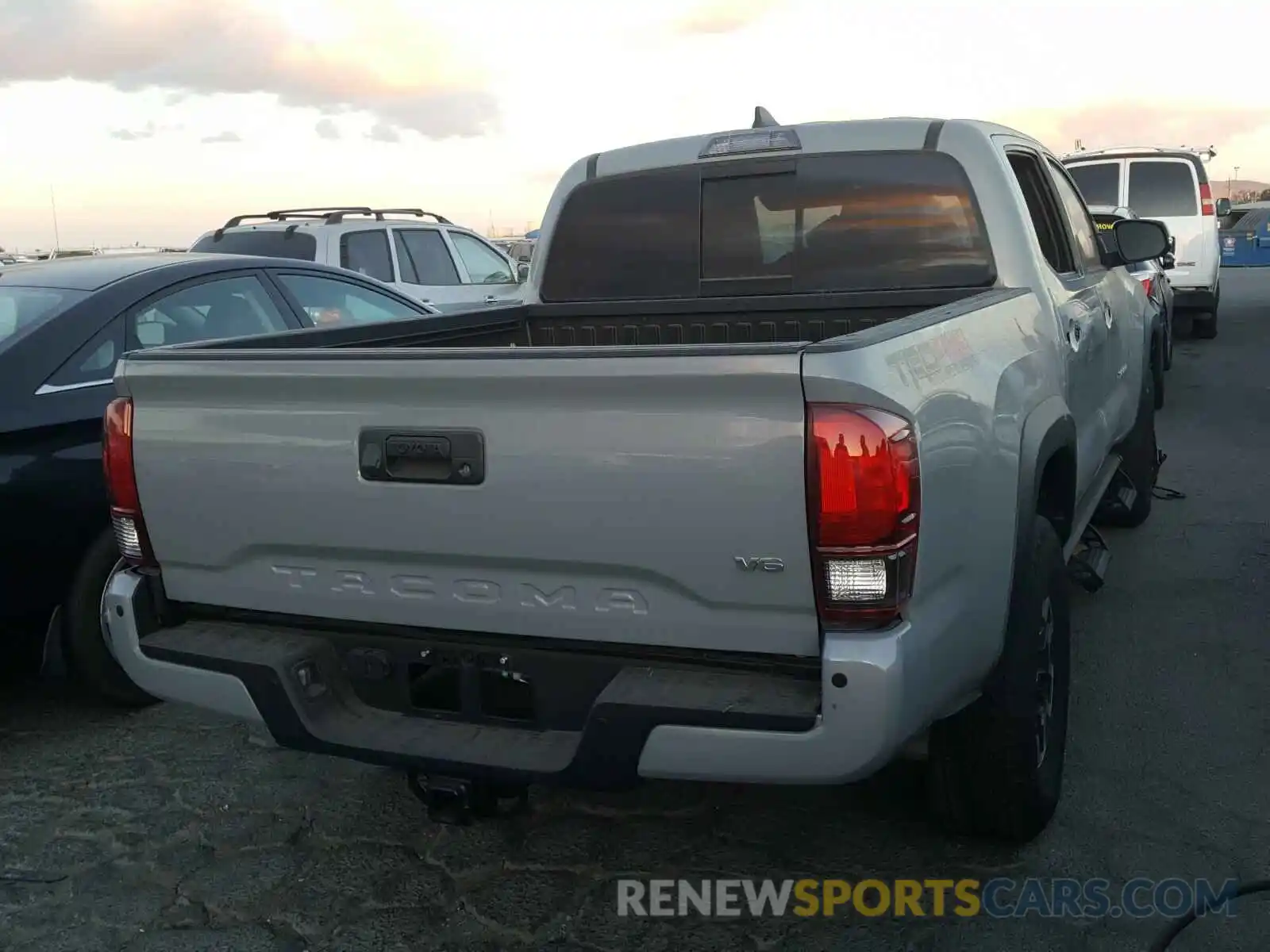 4 Photograph of a damaged car 3TMCZ5AN6KM260168 TOYOTA TACOMA 2019