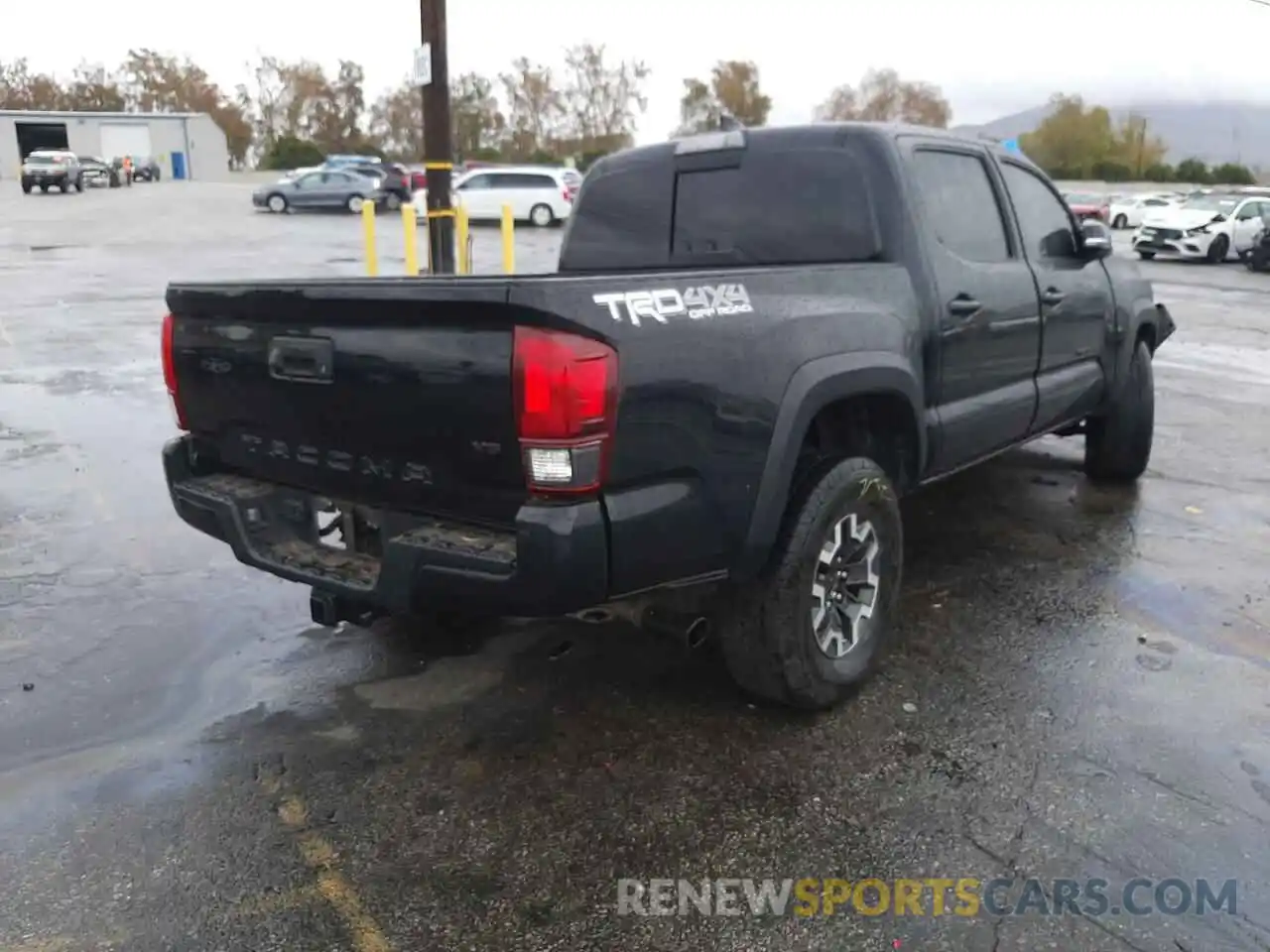 4 Photograph of a damaged car 3TMCZ5AN6KM263054 TOYOTA TACOMA 2019