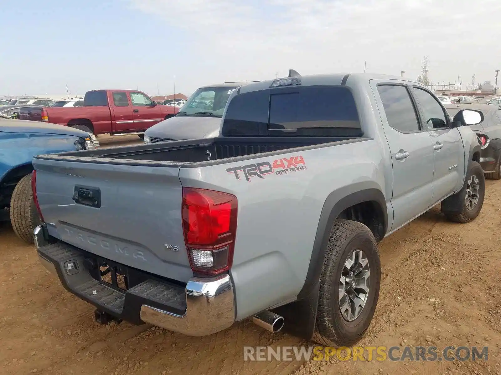 4 Photograph of a damaged car 3TMCZ5AN6KM263541 TOYOTA TACOMA 2019