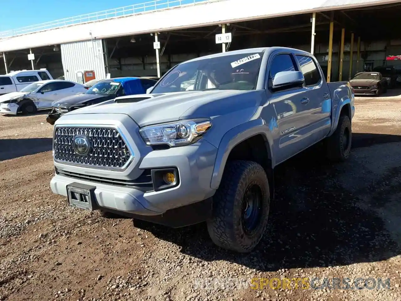 2 Photograph of a damaged car 3TMCZ5AN6KM268321 TOYOTA TACOMA 2019