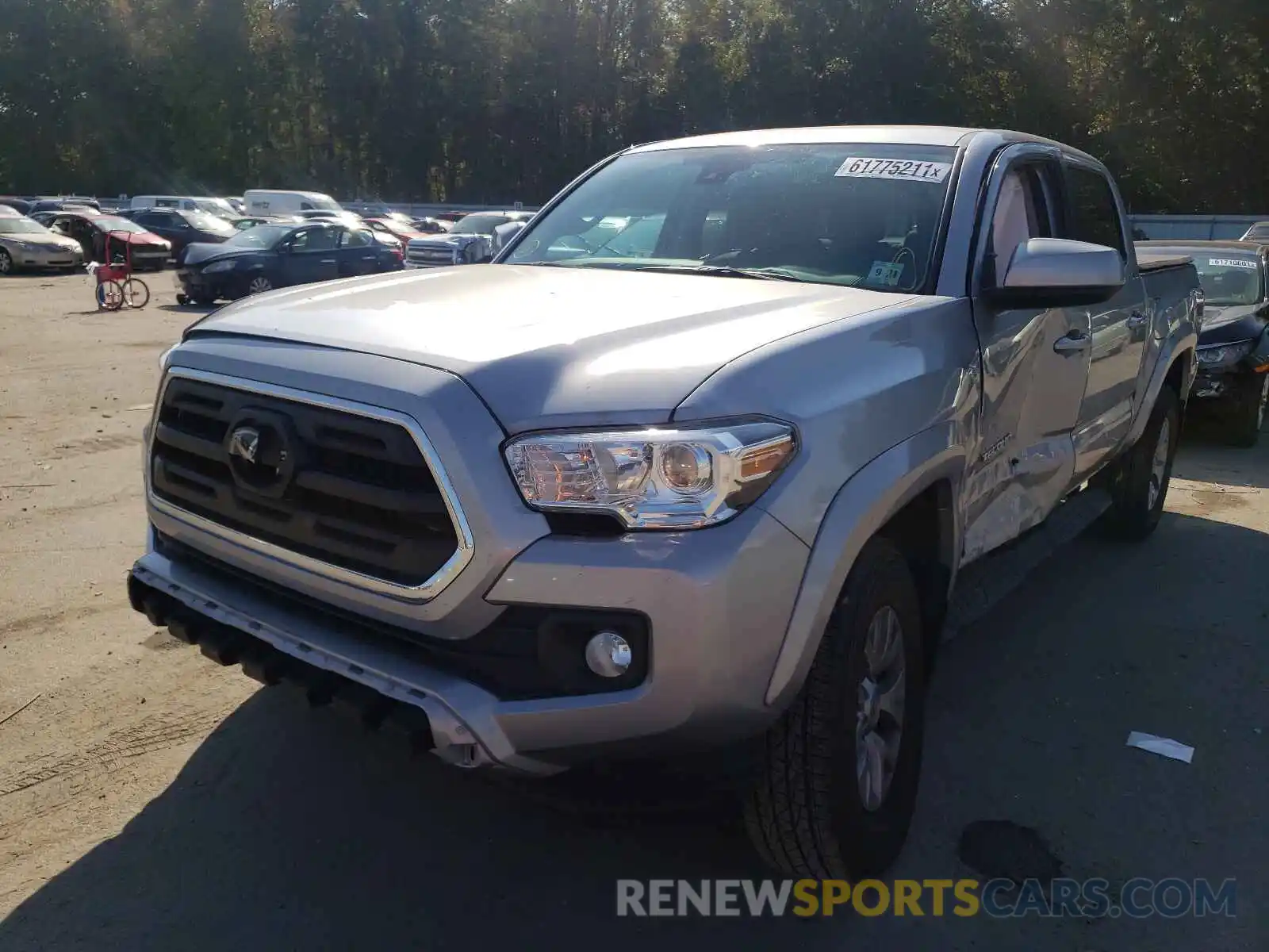 2 Photograph of a damaged car 3TMCZ5AN6KM269839 TOYOTA TACOMA 2019