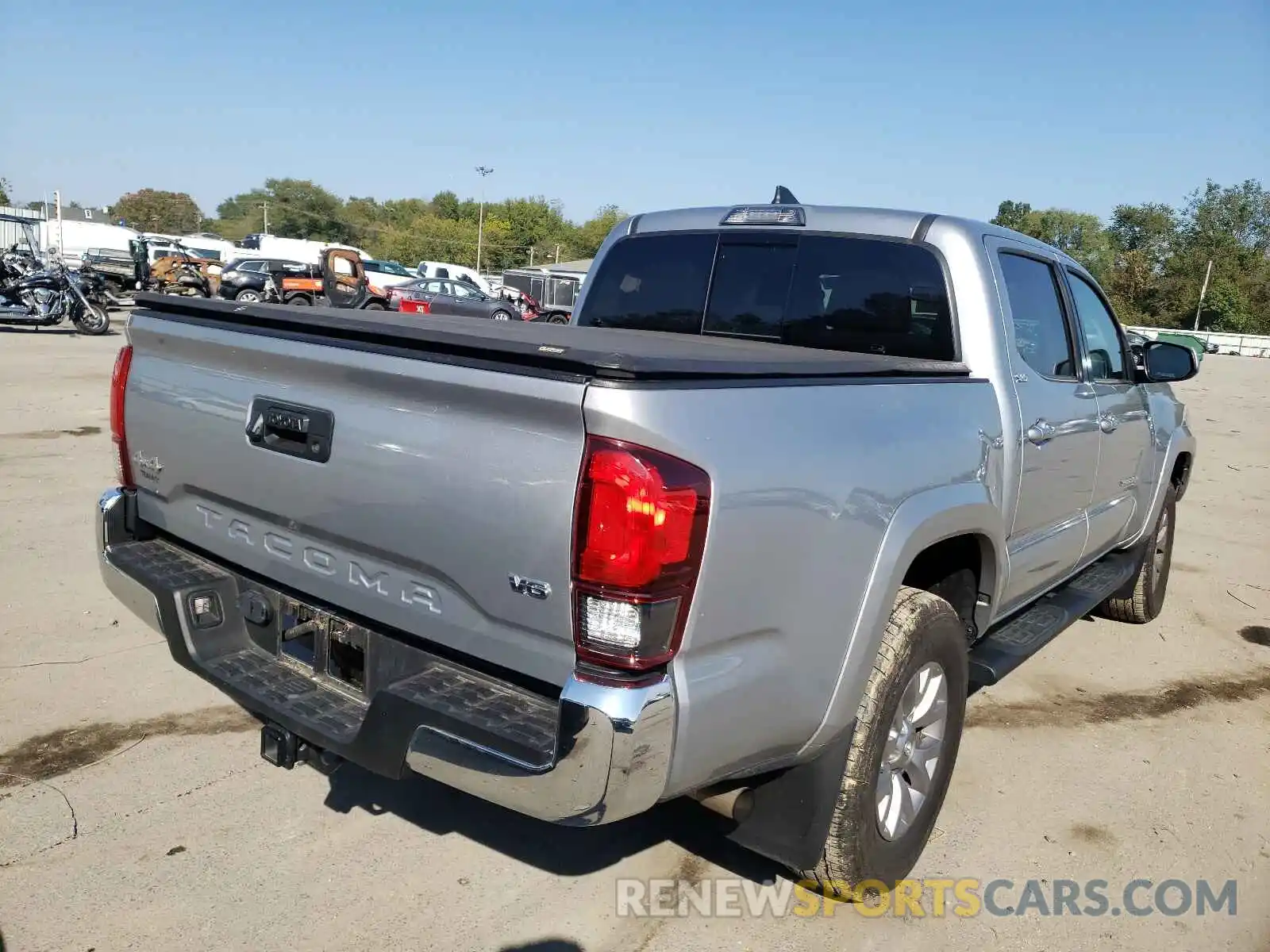 4 Photograph of a damaged car 3TMCZ5AN6KM269839 TOYOTA TACOMA 2019