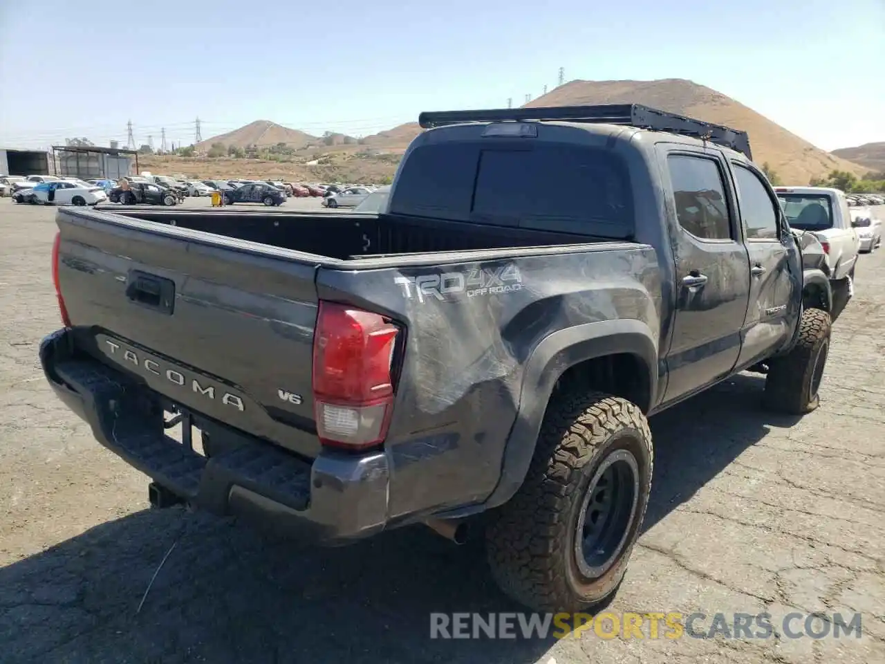 4 Photograph of a damaged car 3TMCZ5AN6KM271042 TOYOTA TACOMA 2019