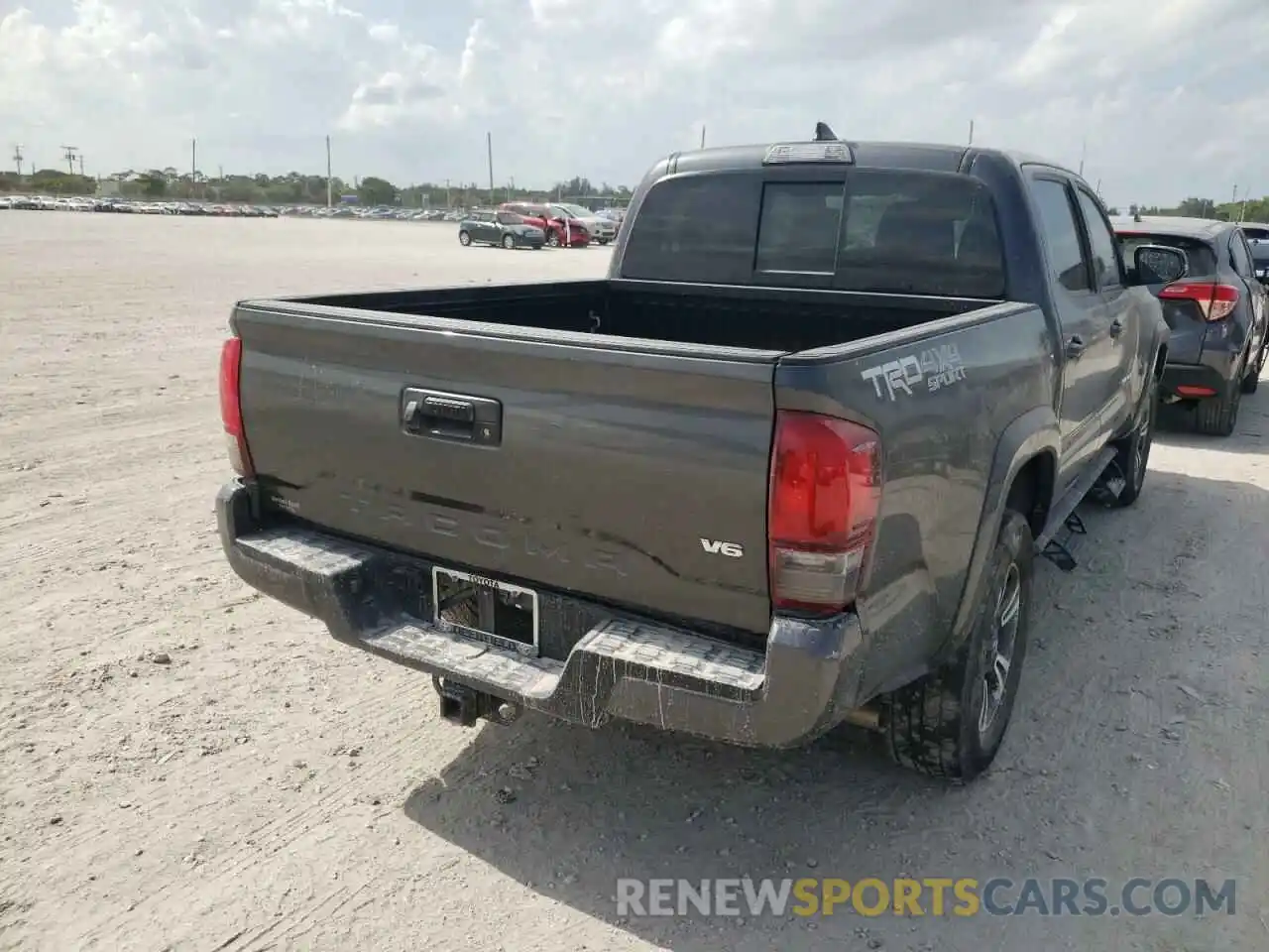 4 Photograph of a damaged car 3TMCZ5AN6KM271171 TOYOTA TACOMA 2019