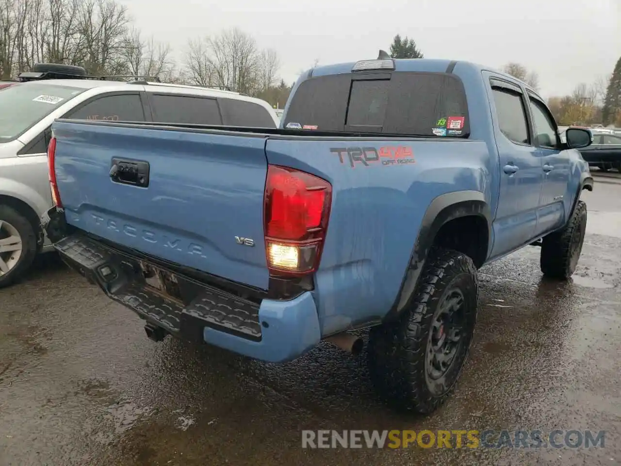 4 Photograph of a damaged car 3TMCZ5AN6KM276385 TOYOTA TACOMA 2019