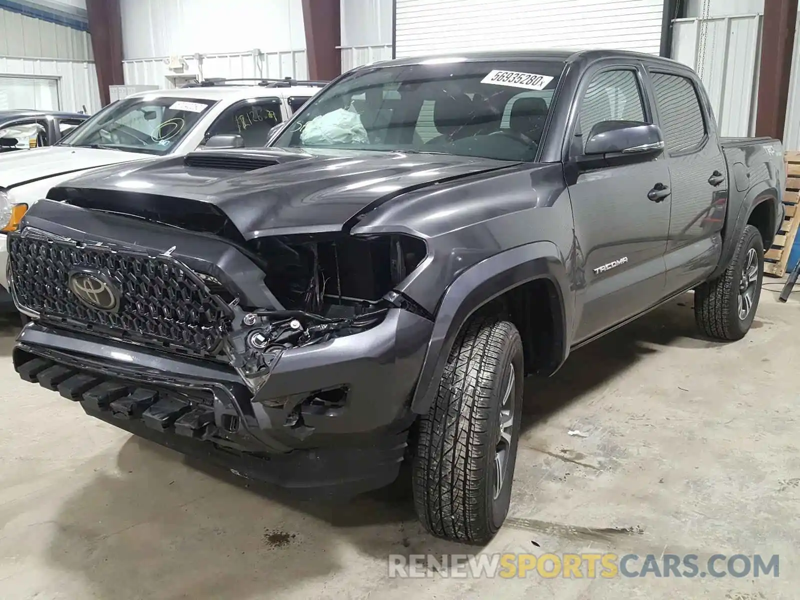 2 Photograph of a damaged car 3TMCZ5AN6KM279321 TOYOTA TACOMA 2019