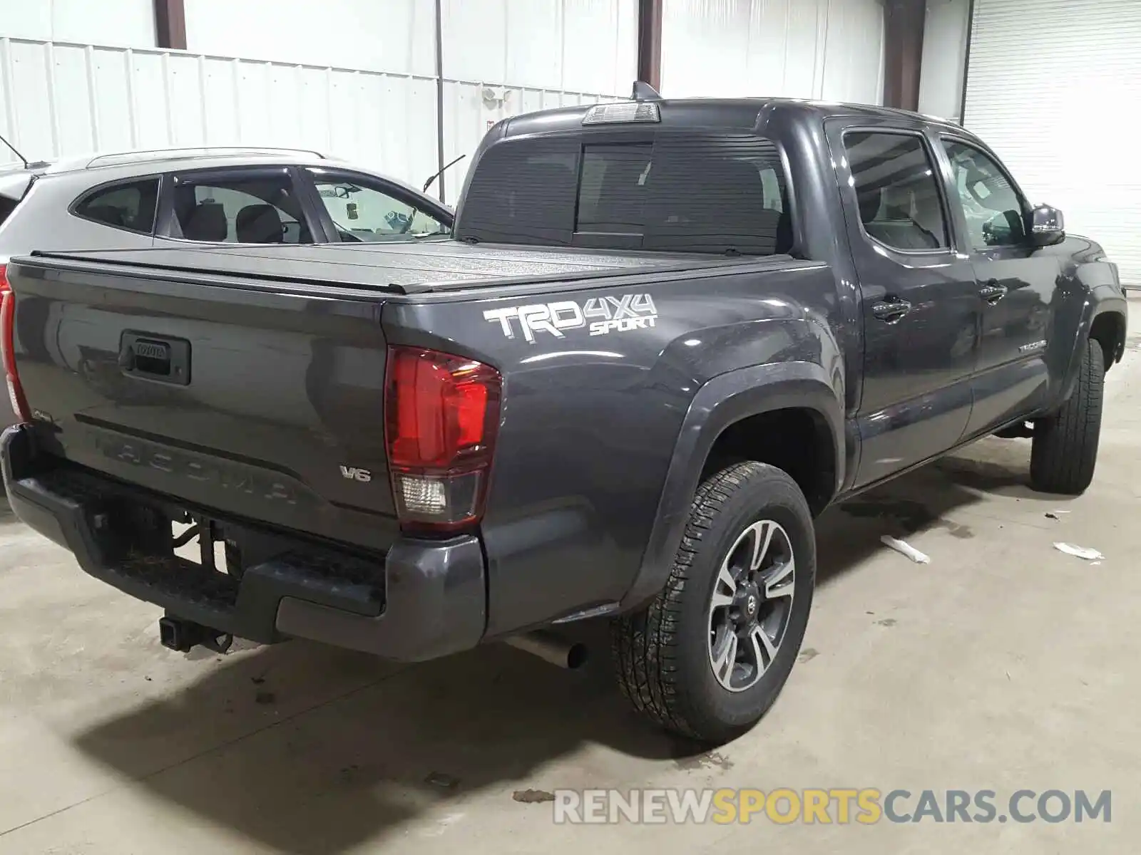 4 Photograph of a damaged car 3TMCZ5AN6KM279321 TOYOTA TACOMA 2019