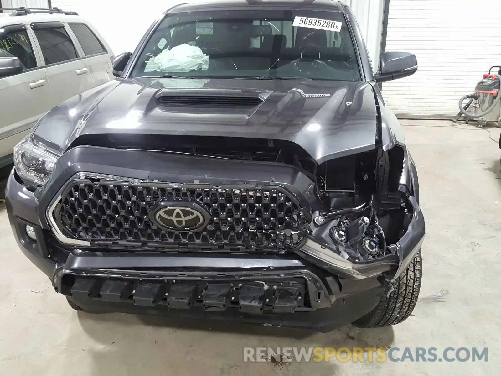 9 Photograph of a damaged car 3TMCZ5AN6KM279321 TOYOTA TACOMA 2019