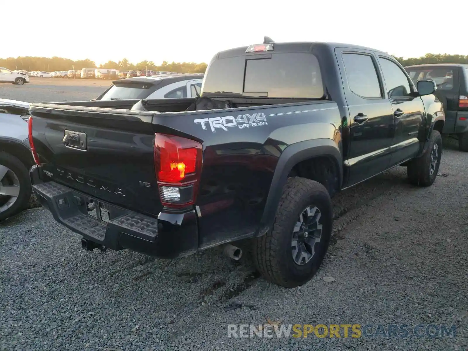 4 Photograph of a damaged car 3TMCZ5AN6KM281232 TOYOTA TACOMA 2019