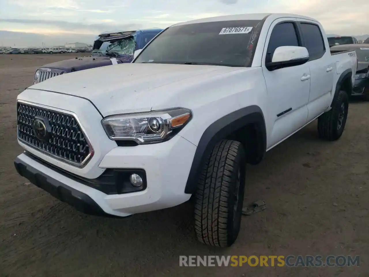 2 Photograph of a damaged car 3TMCZ5AN6KM284437 TOYOTA TACOMA 2019