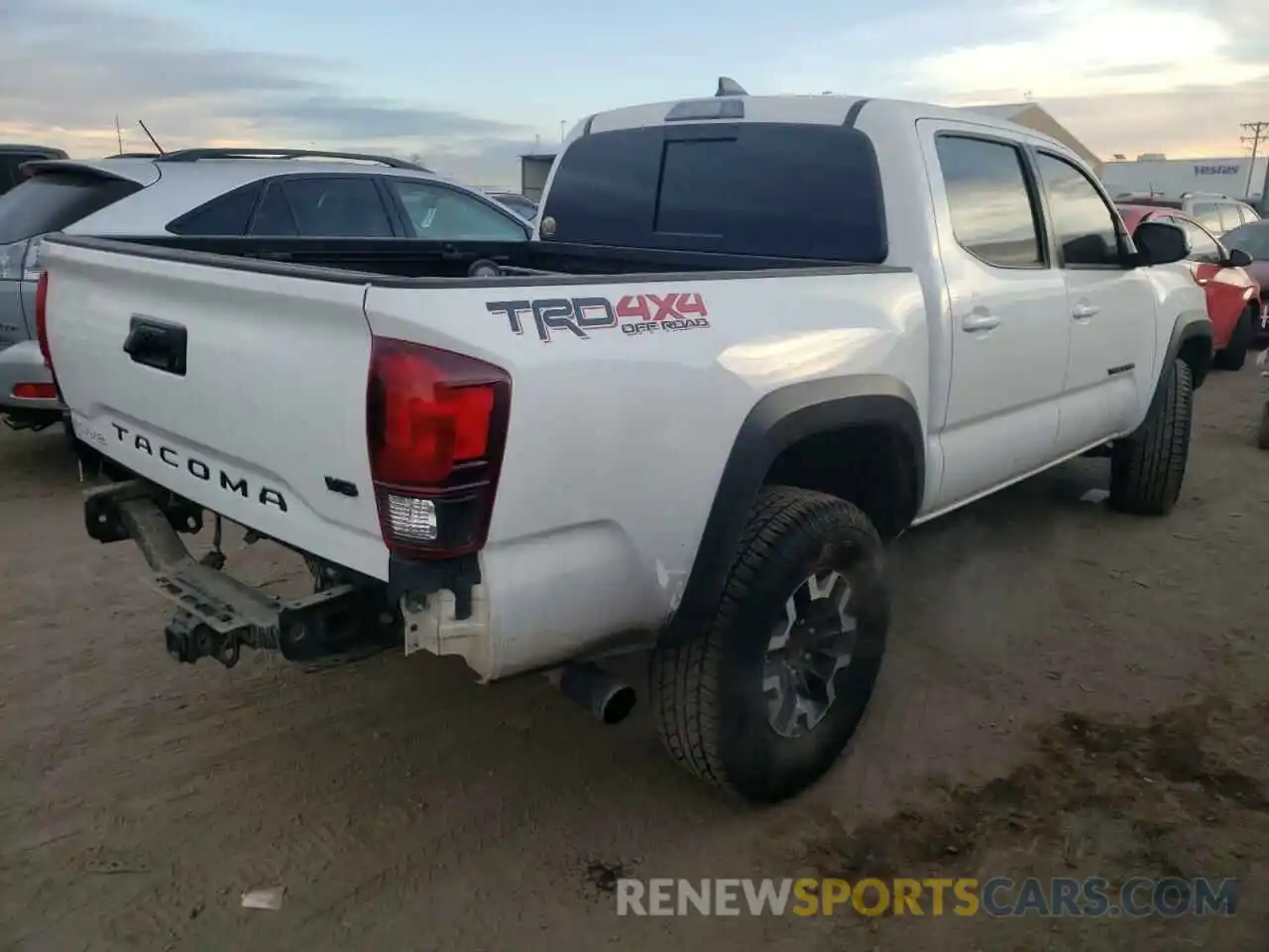 4 Photograph of a damaged car 3TMCZ5AN6KM284437 TOYOTA TACOMA 2019