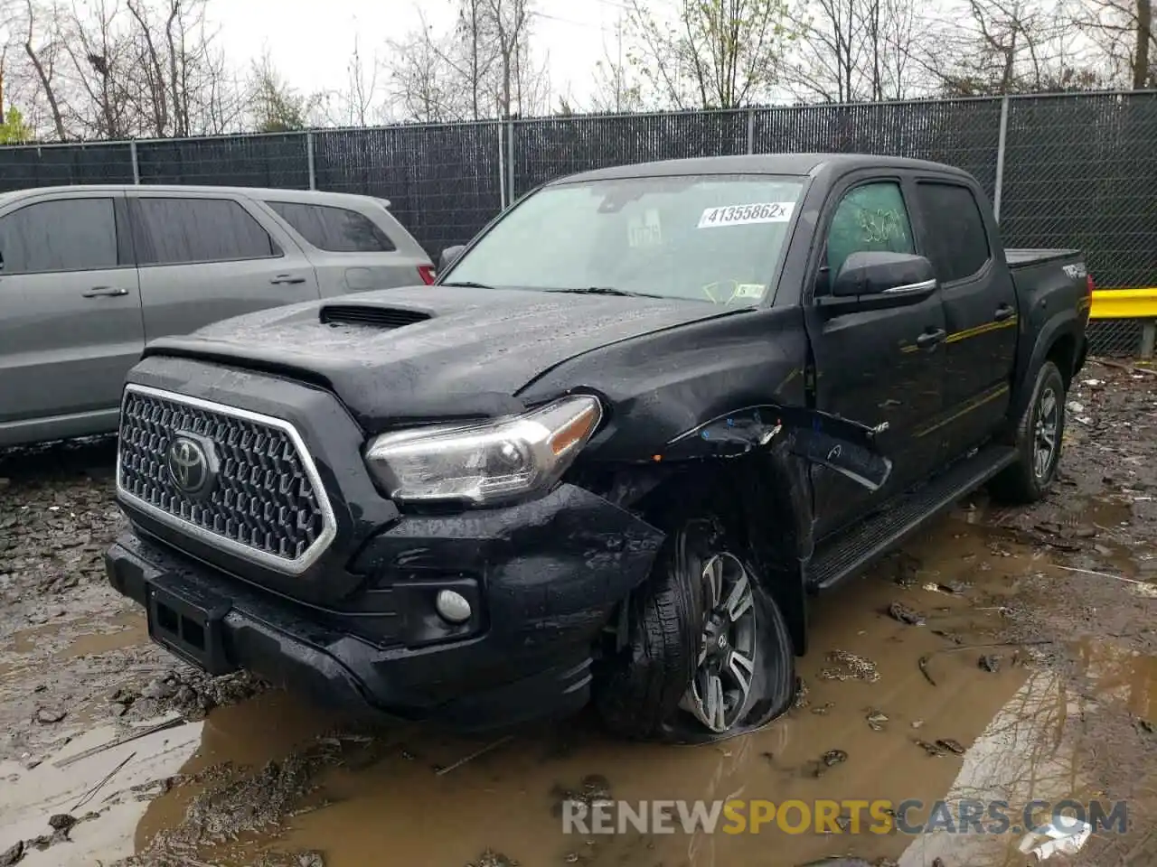 2 Photograph of a damaged car 3TMCZ5AN6KM286477 TOYOTA TACOMA 2019