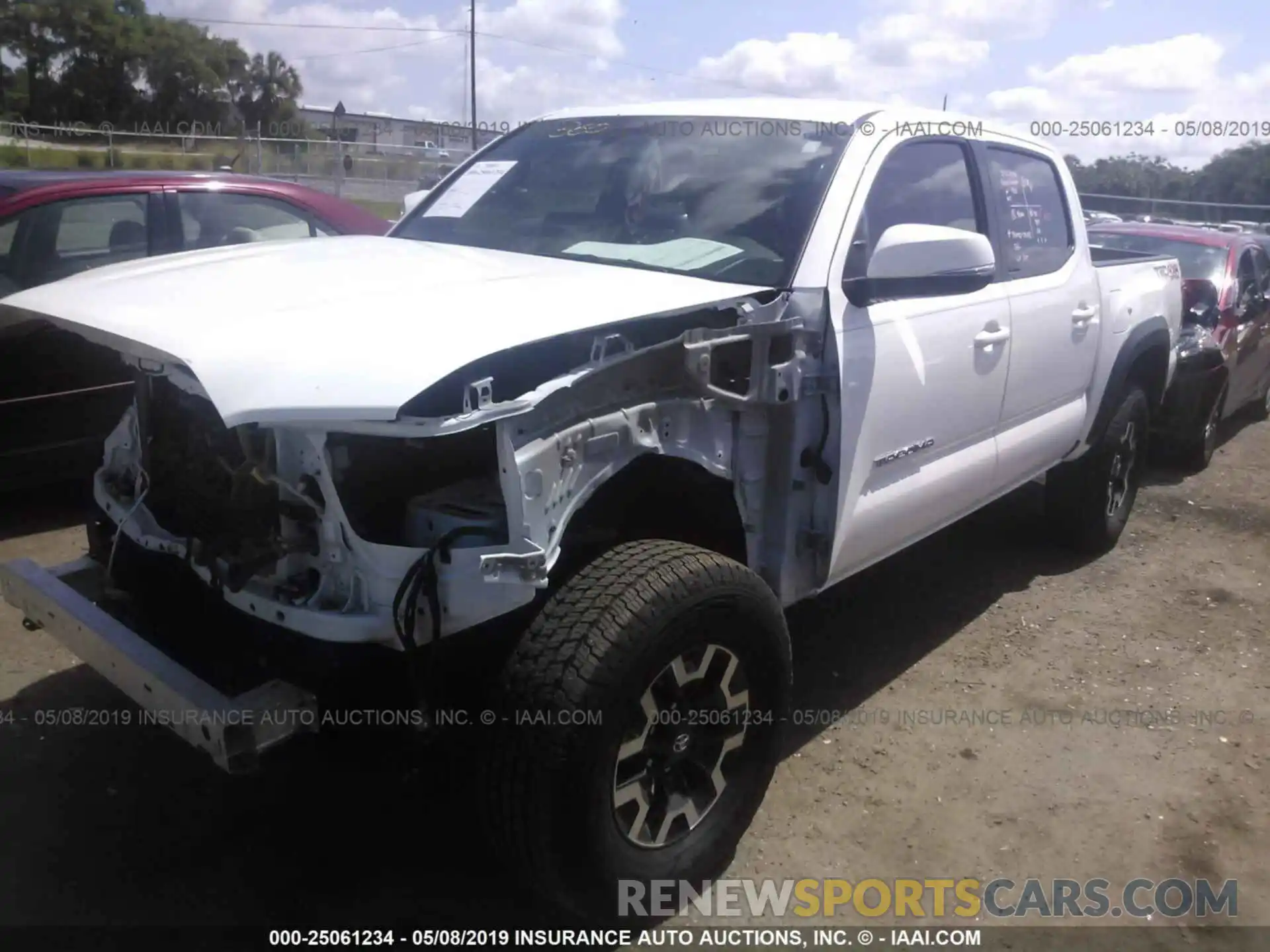 2 Photograph of a damaged car 3TMCZ5AN7KM190938 TOYOTA TACOMA 2019