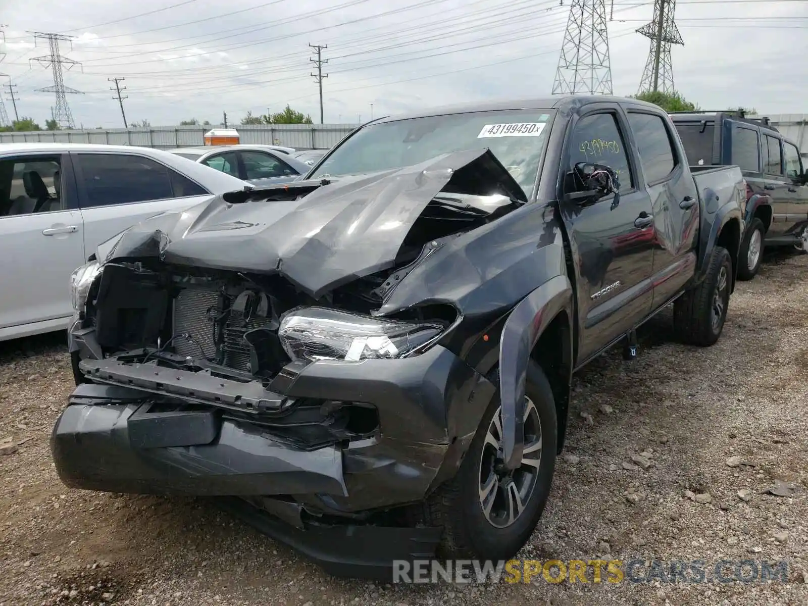 2 Photograph of a damaged car 3TMCZ5AN7KM194018 TOYOTA TACOMA 2019