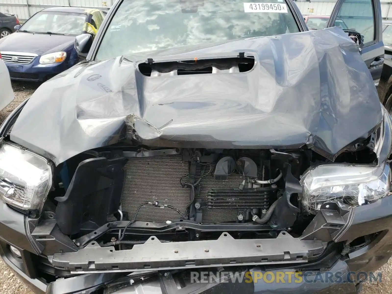 7 Photograph of a damaged car 3TMCZ5AN7KM194018 TOYOTA TACOMA 2019