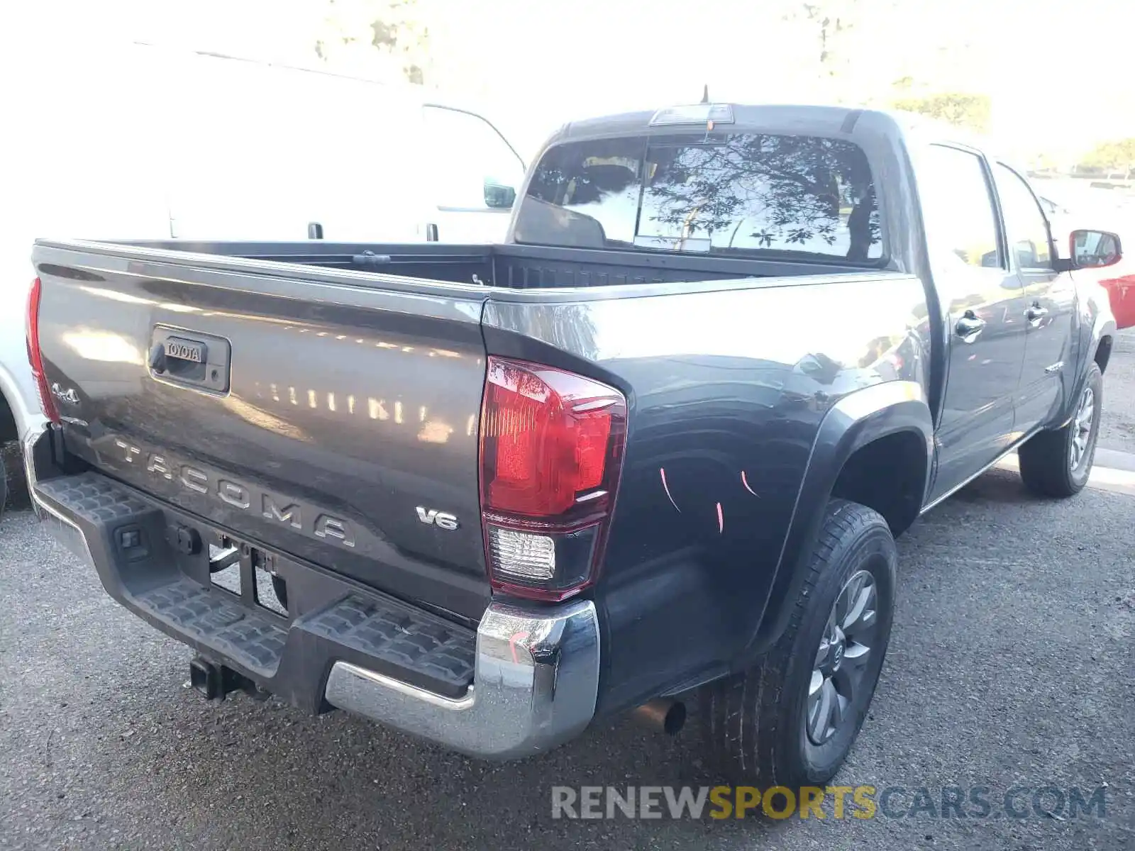 4 Photograph of a damaged car 3TMCZ5AN7KM198246 TOYOTA TACOMA 2019