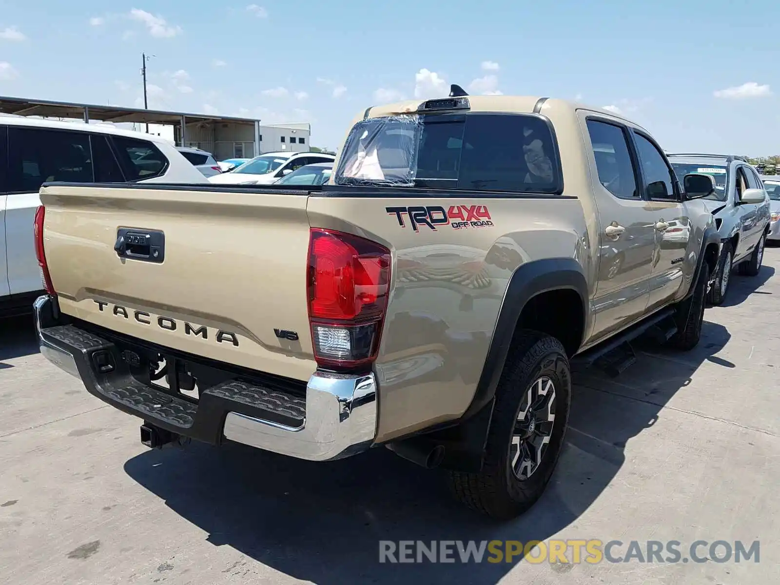 4 Photograph of a damaged car 3TMCZ5AN7KM198960 TOYOTA TACOMA 2019