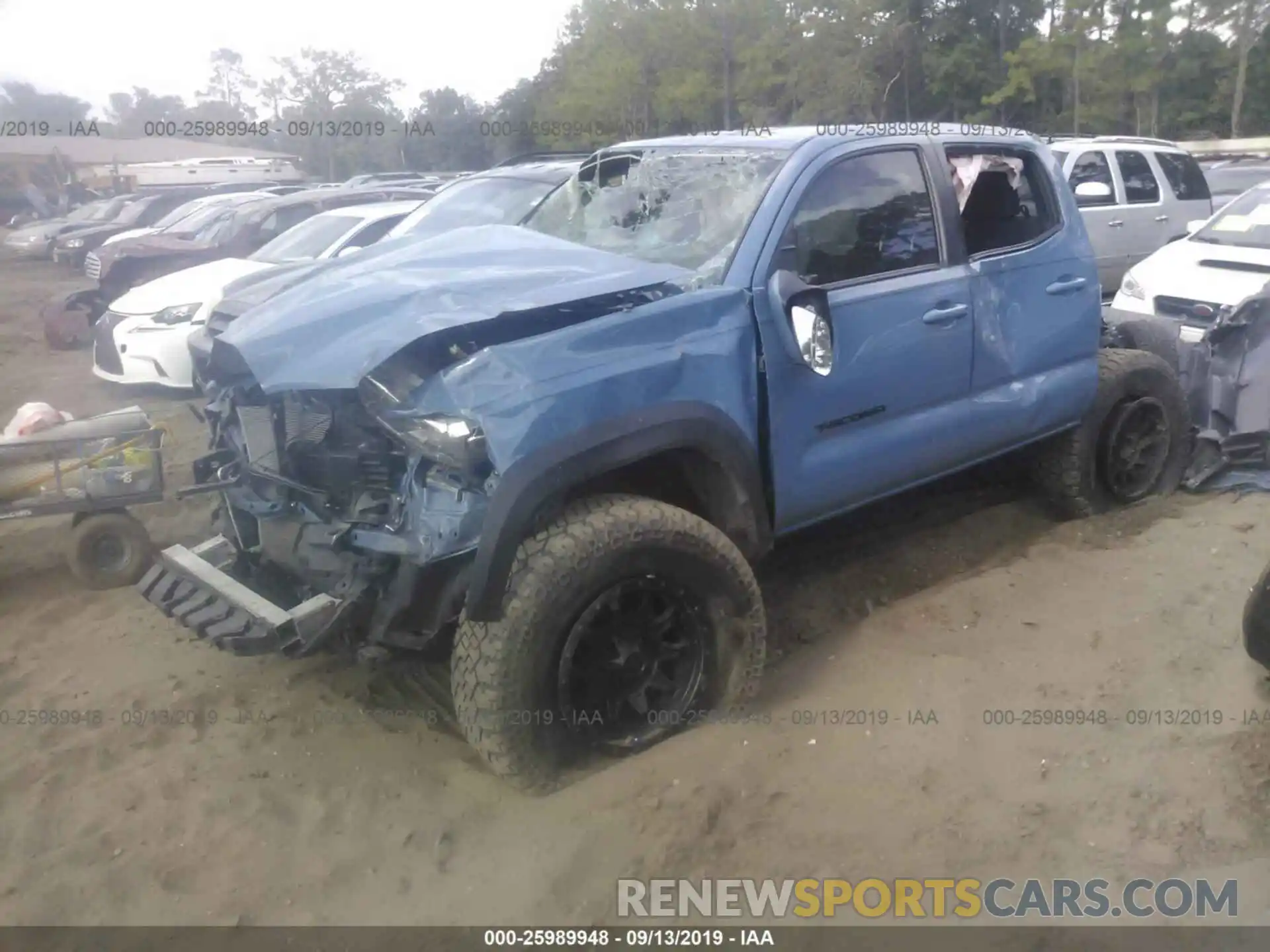 2 Photograph of a damaged car 3TMCZ5AN7KM199882 TOYOTA TACOMA 2019