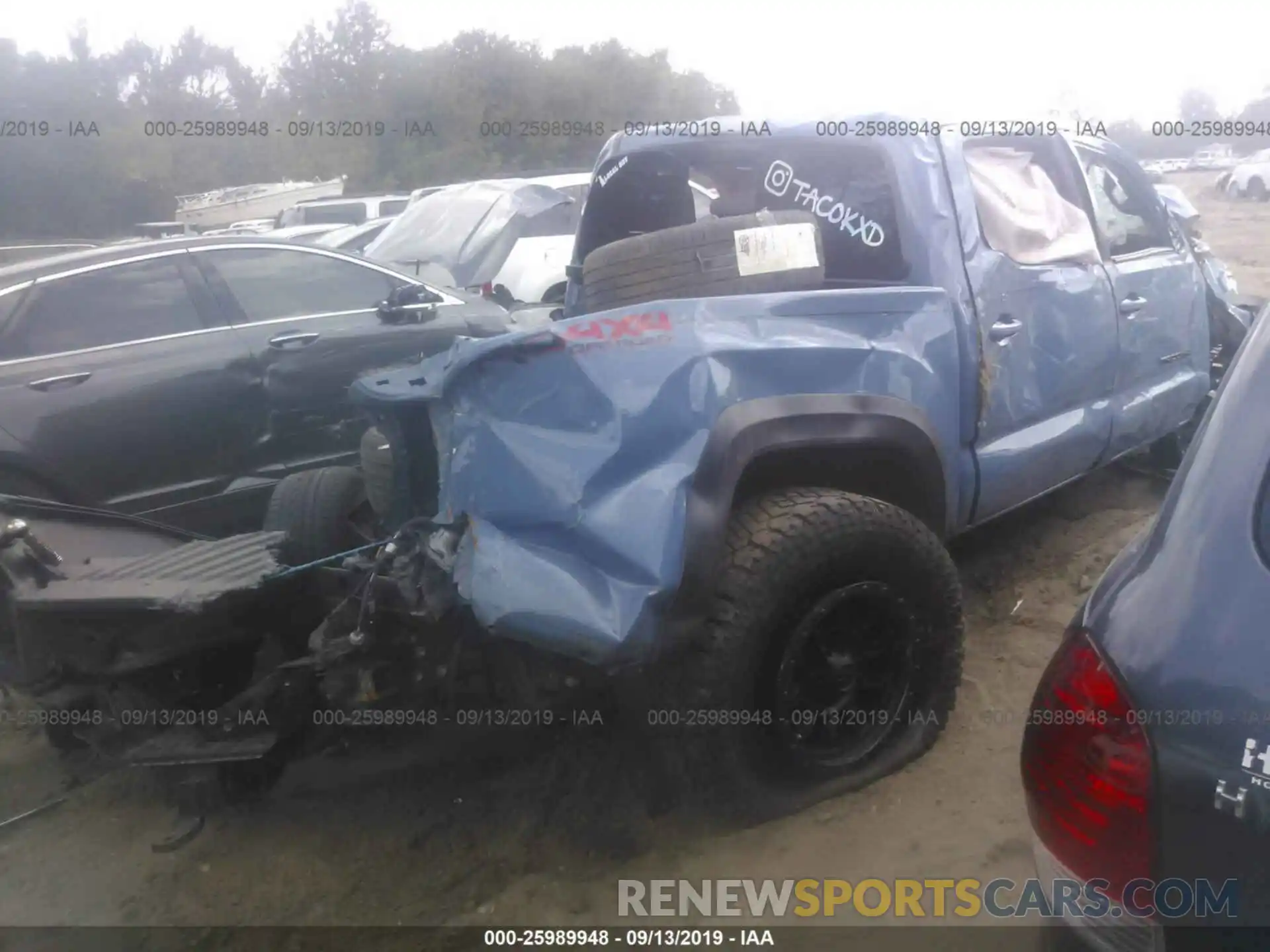 4 Photograph of a damaged car 3TMCZ5AN7KM199882 TOYOTA TACOMA 2019