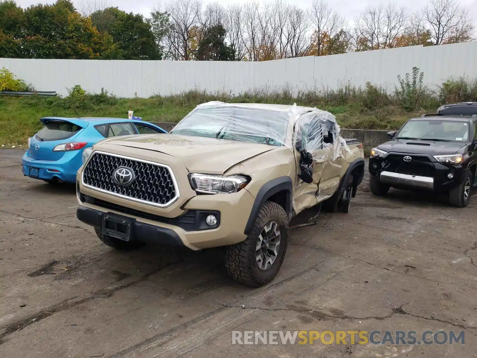 2 Photograph of a damaged car 3TMCZ5AN7KM202182 TOYOTA TACOMA 2019