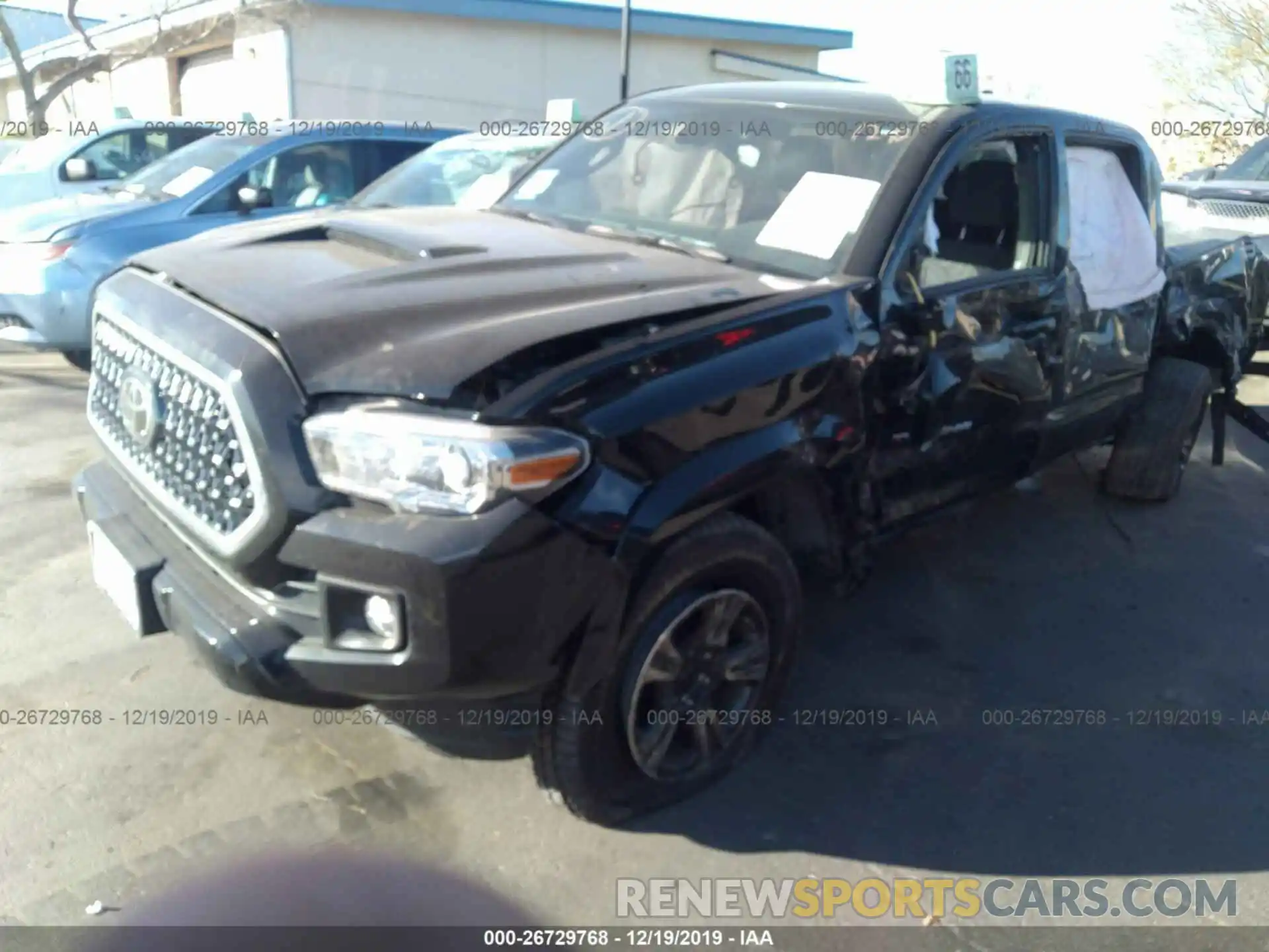 2 Photograph of a damaged car 3TMCZ5AN7KM202540 TOYOTA TACOMA 2019