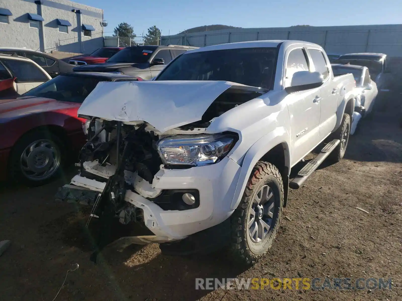 2 Photograph of a damaged car 3TMCZ5AN7KM203638 TOYOTA TACOMA 2019