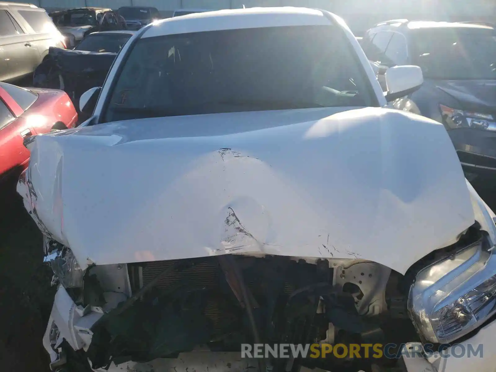 7 Photograph of a damaged car 3TMCZ5AN7KM203638 TOYOTA TACOMA 2019