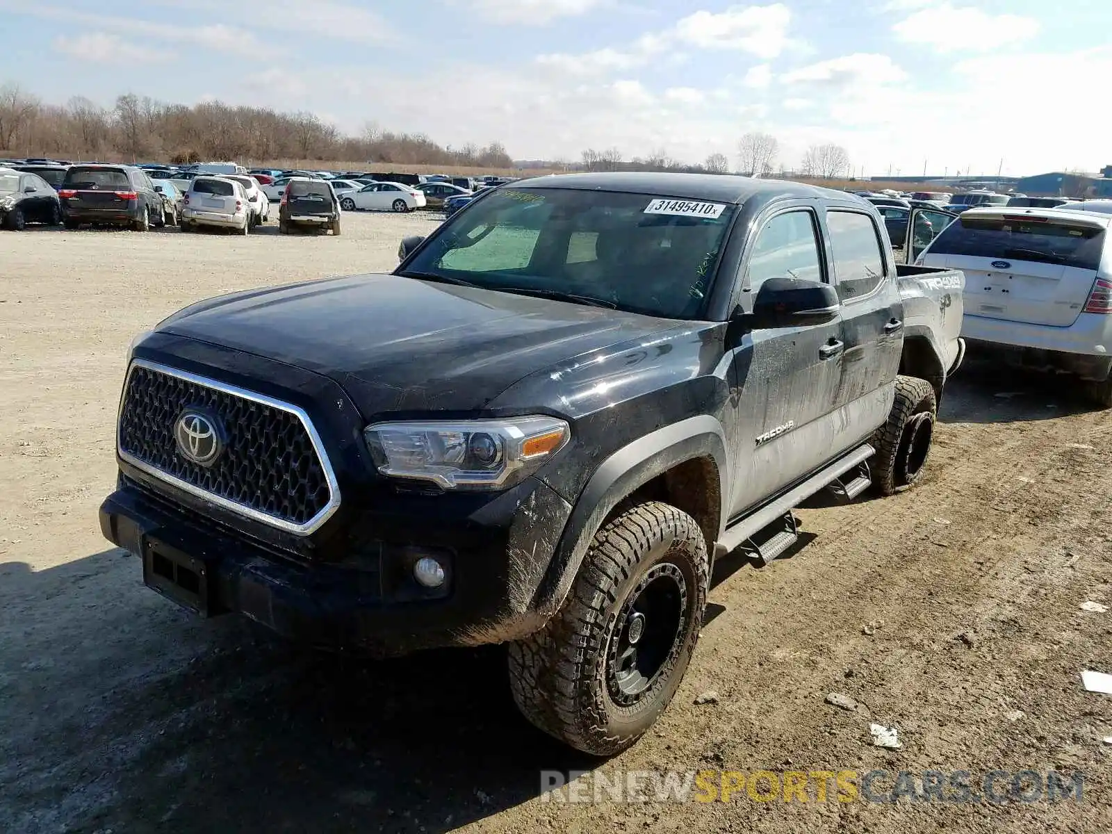 2 Photograph of a damaged car 3TMCZ5AN7KM203834 TOYOTA TACOMA 2019