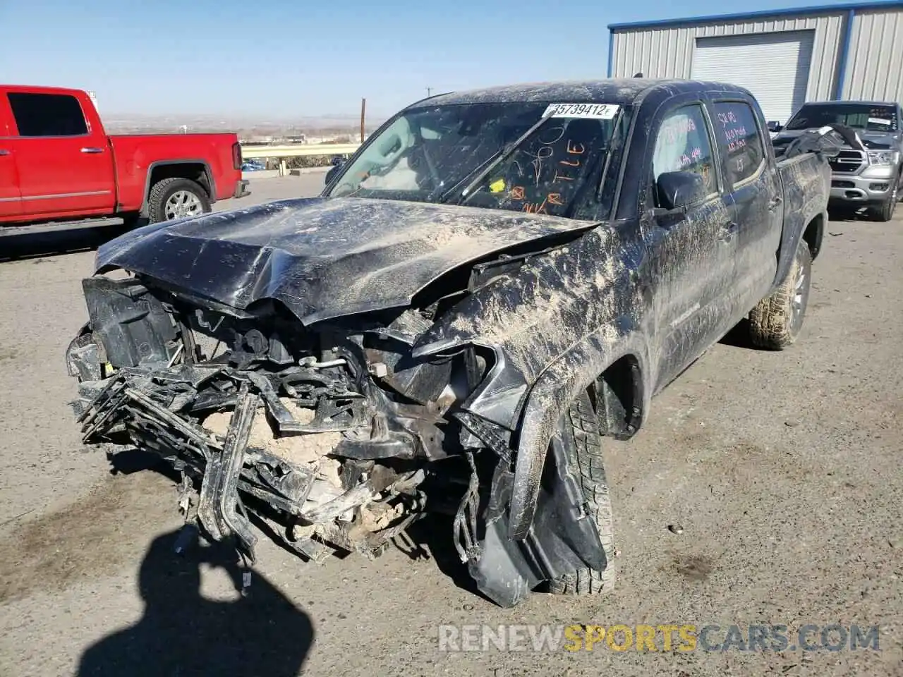 2 Photograph of a damaged car 3TMCZ5AN7KM204823 TOYOTA TACOMA 2019