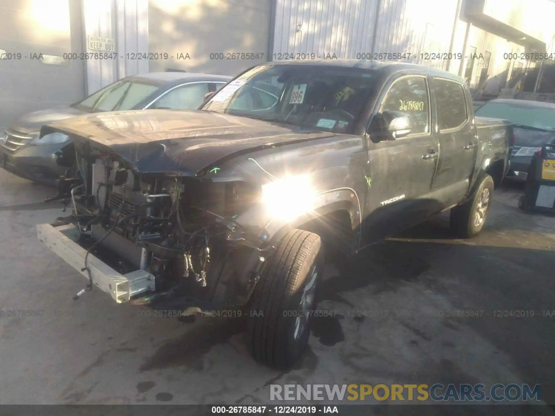 2 Photograph of a damaged car 3TMCZ5AN7KM205535 TOYOTA TACOMA 2019