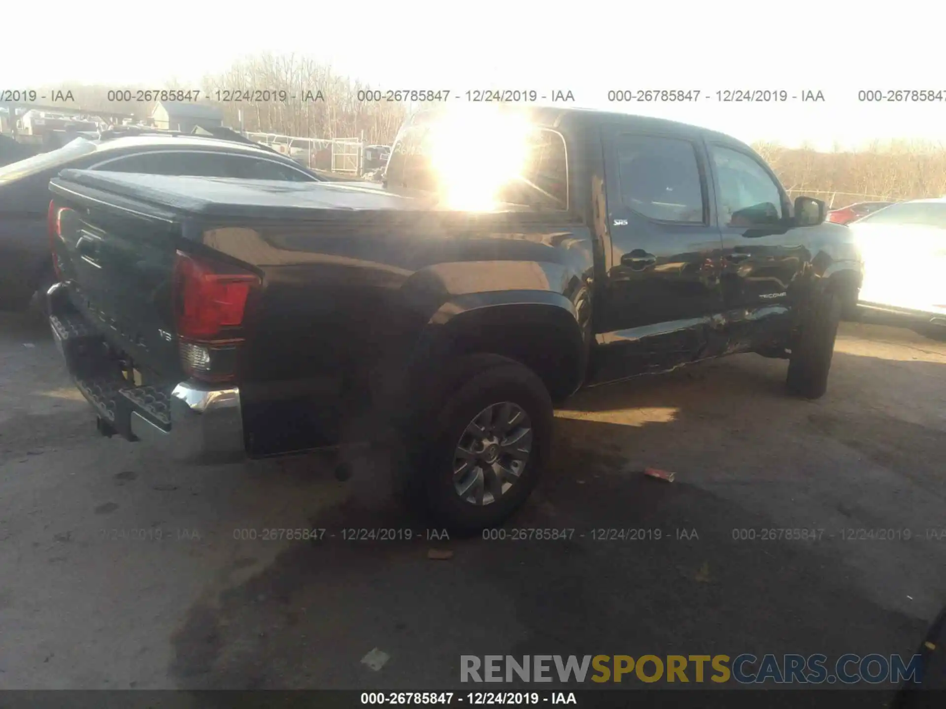 4 Photograph of a damaged car 3TMCZ5AN7KM205535 TOYOTA TACOMA 2019