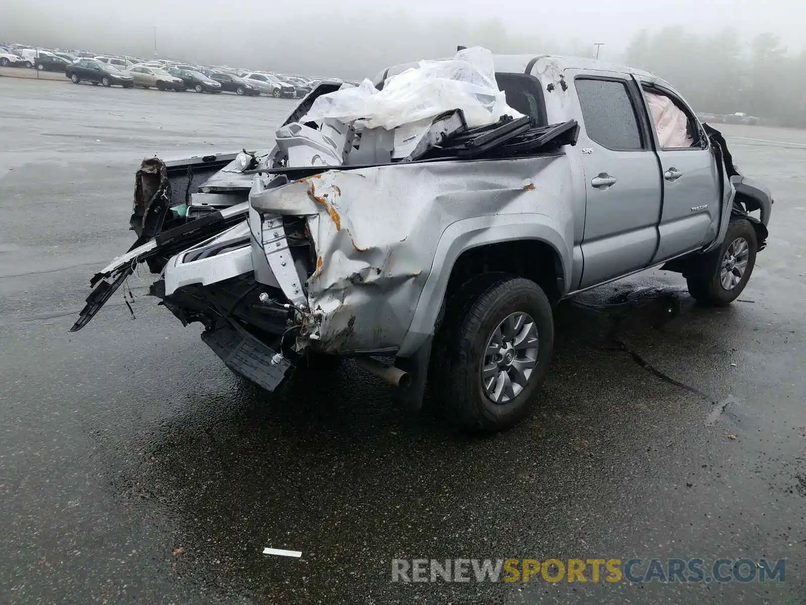 4 Photograph of a damaged car 3TMCZ5AN7KM211934 TOYOTA TACOMA 2019