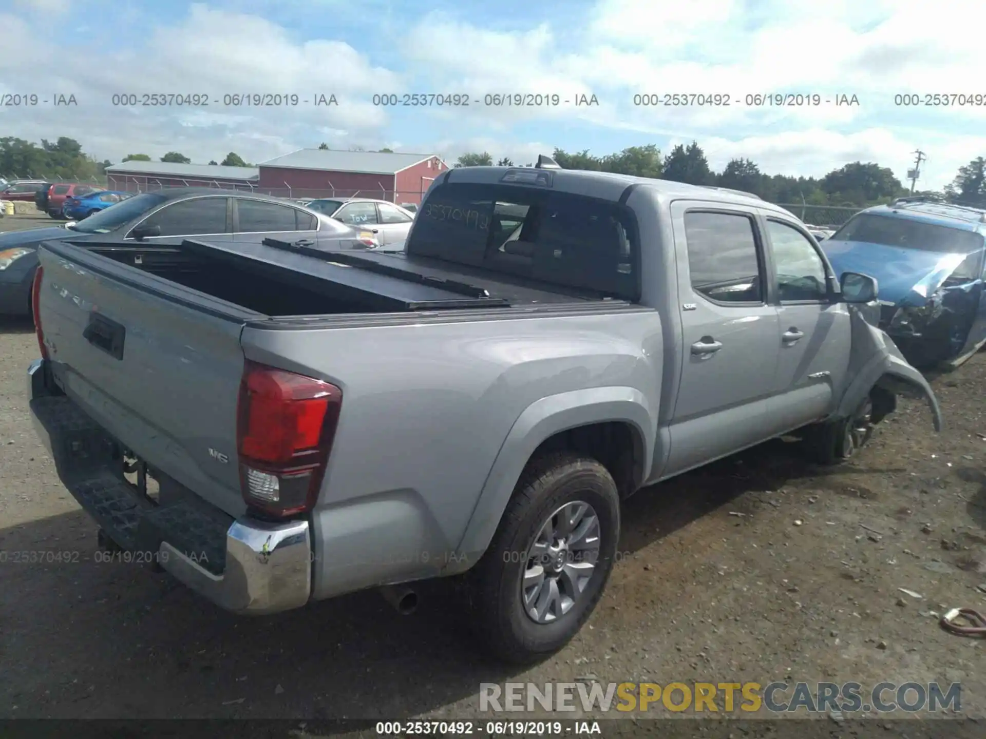 4 Photograph of a damaged car 3TMCZ5AN7KM216308 TOYOTA TACOMA 2019