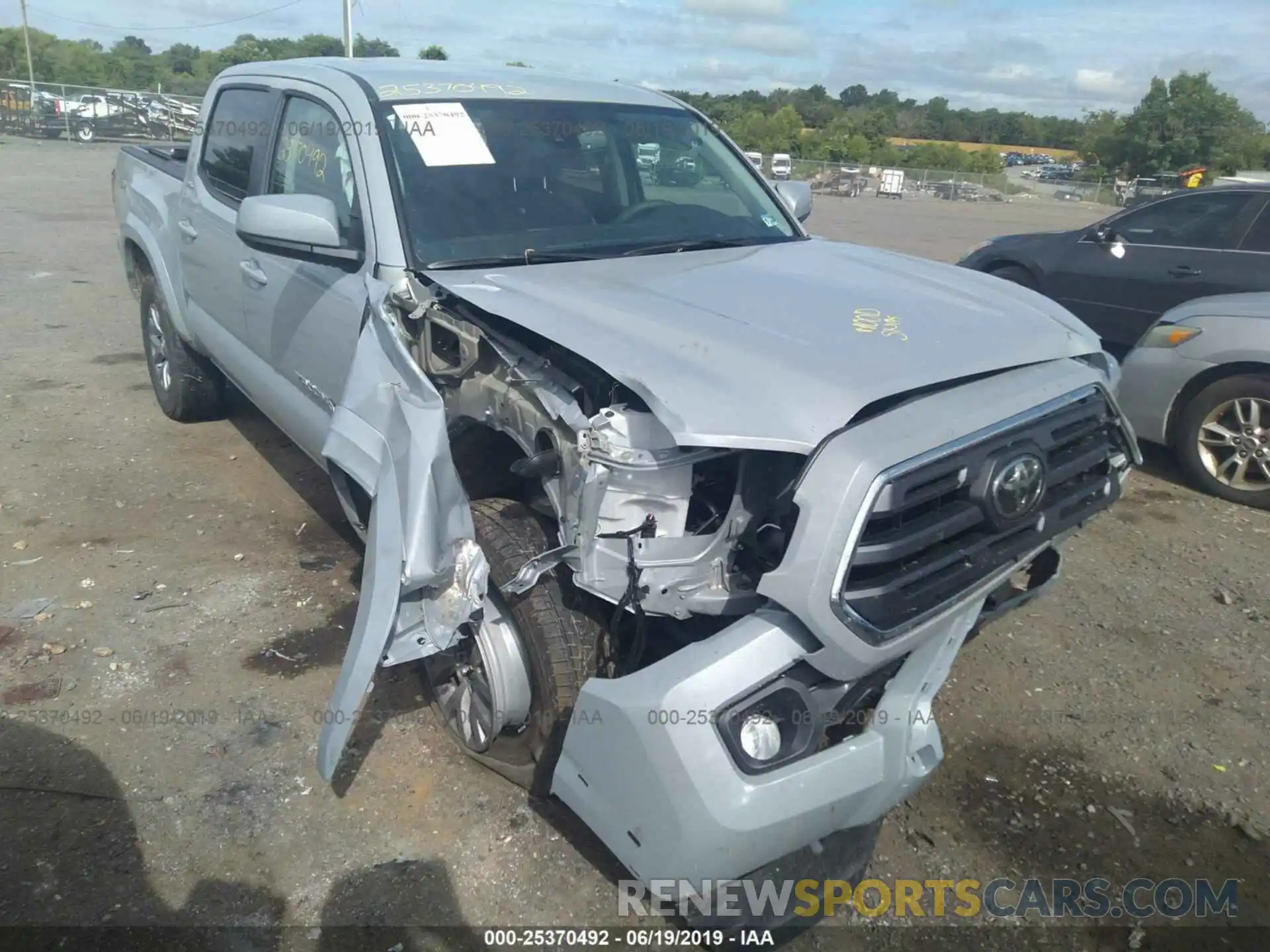 6 Photograph of a damaged car 3TMCZ5AN7KM216308 TOYOTA TACOMA 2019