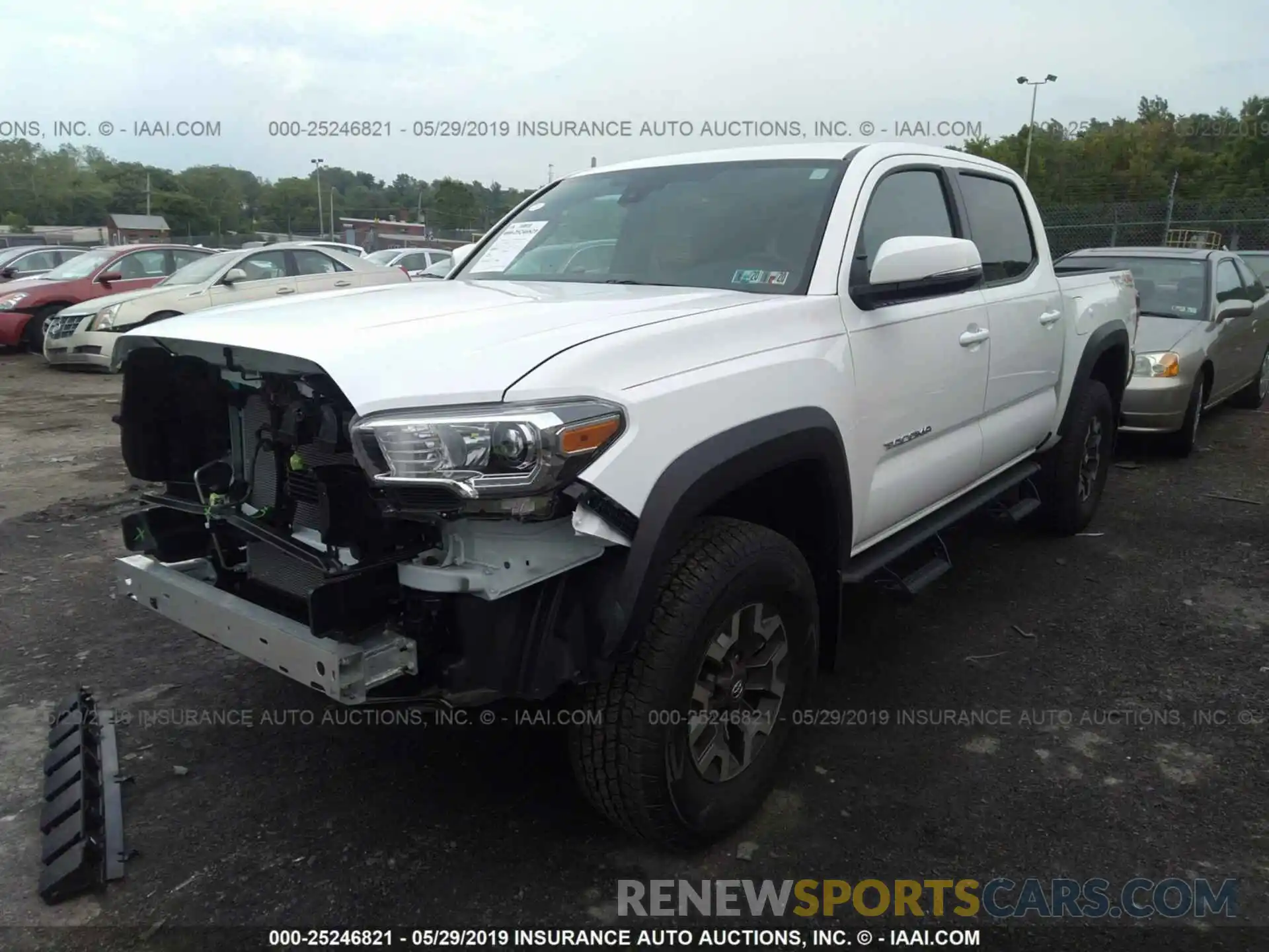 2 Photograph of a damaged car 3TMCZ5AN7KM219225 TOYOTA TACOMA 2019