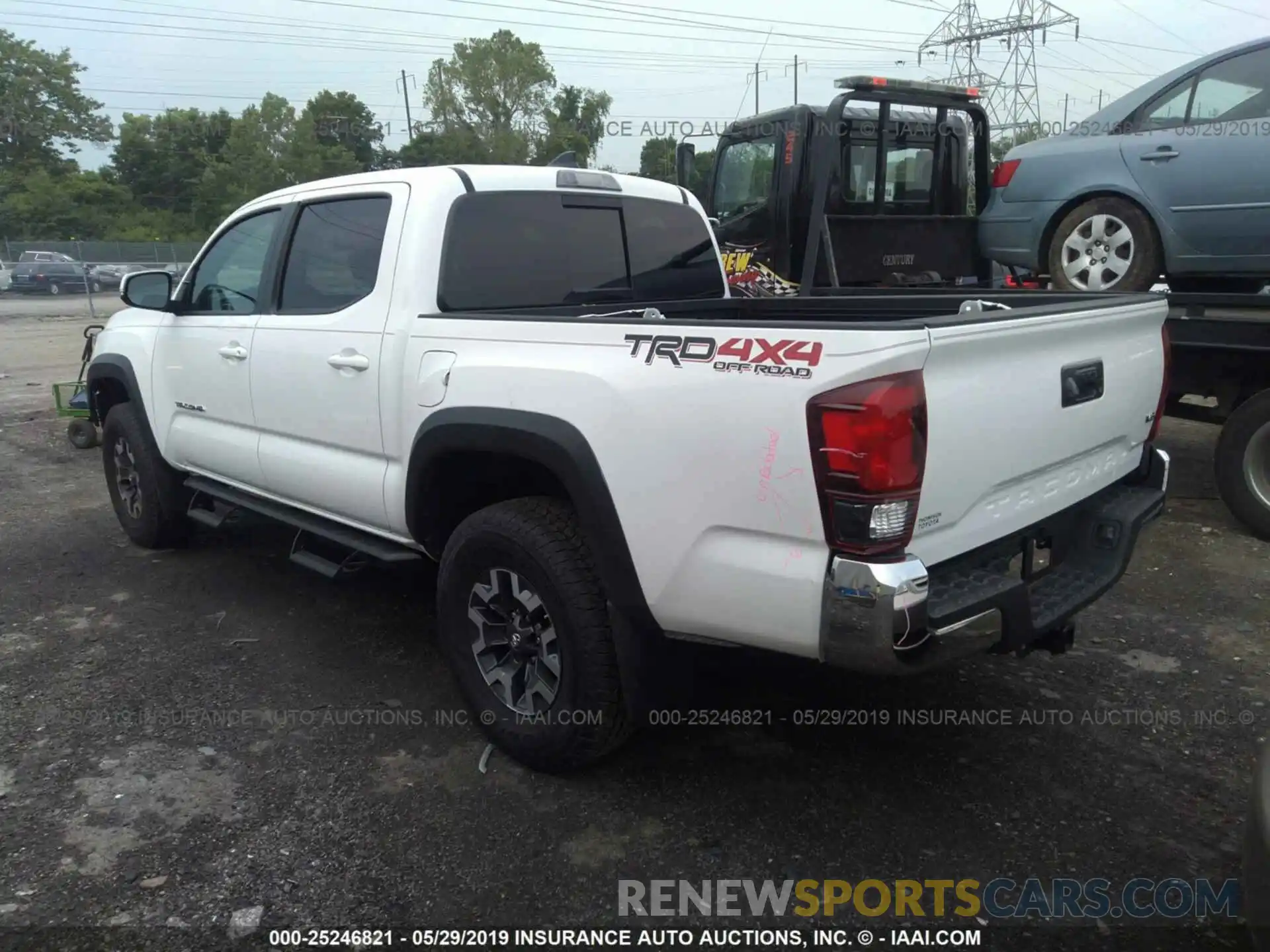 3 Photograph of a damaged car 3TMCZ5AN7KM219225 TOYOTA TACOMA 2019