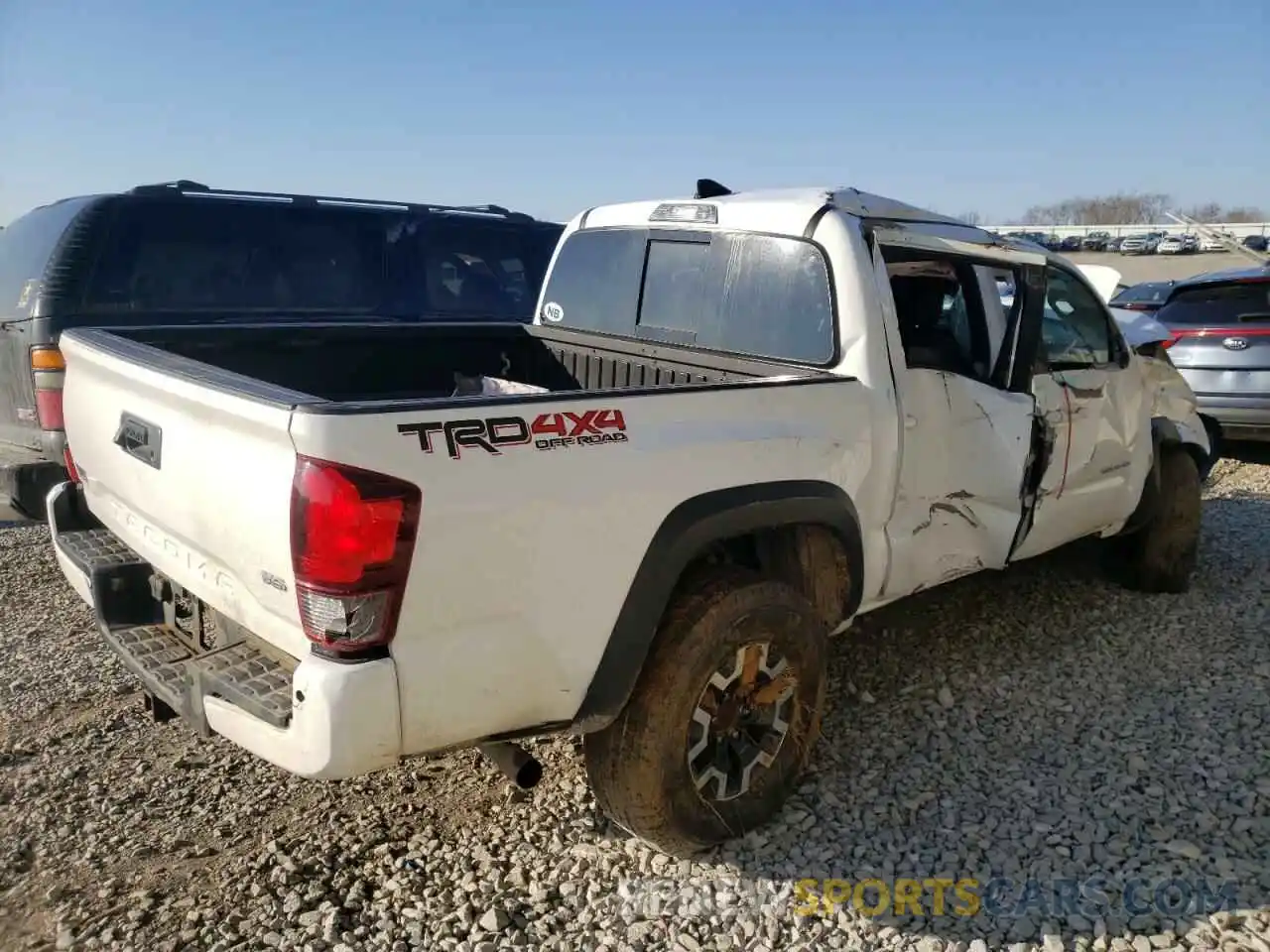 4 Photograph of a damaged car 3TMCZ5AN7KM222657 TOYOTA TACOMA 2019