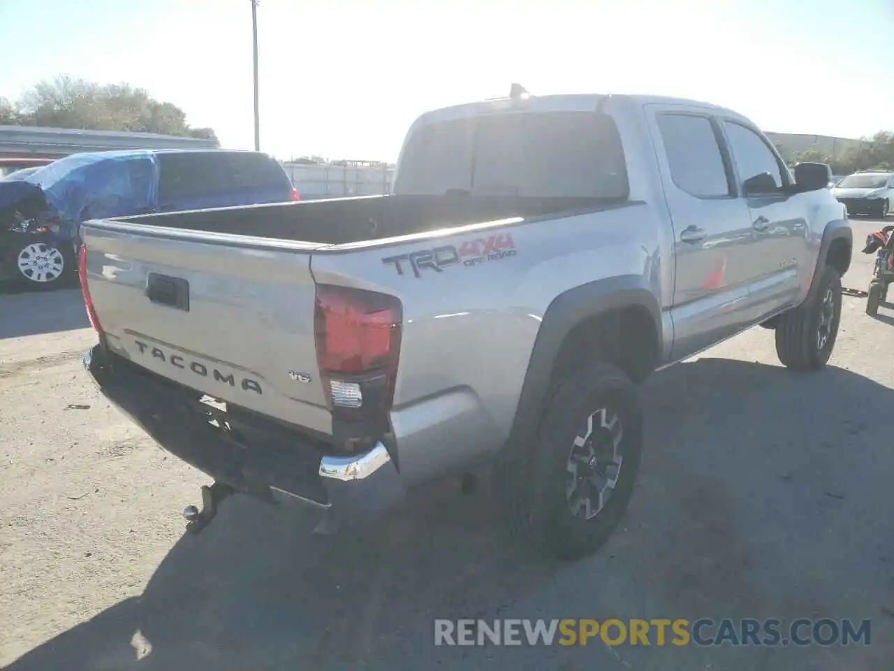 4 Photograph of a damaged car 3TMCZ5AN7KM223517 TOYOTA TACOMA 2019